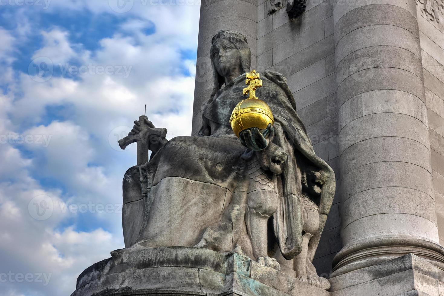 The Pont Alexandre III is a deck arch bridge that spans the Seine in Paris. It connects the Champs-Elysees quarter with those of the Invalides and Eiffel Tower. photo