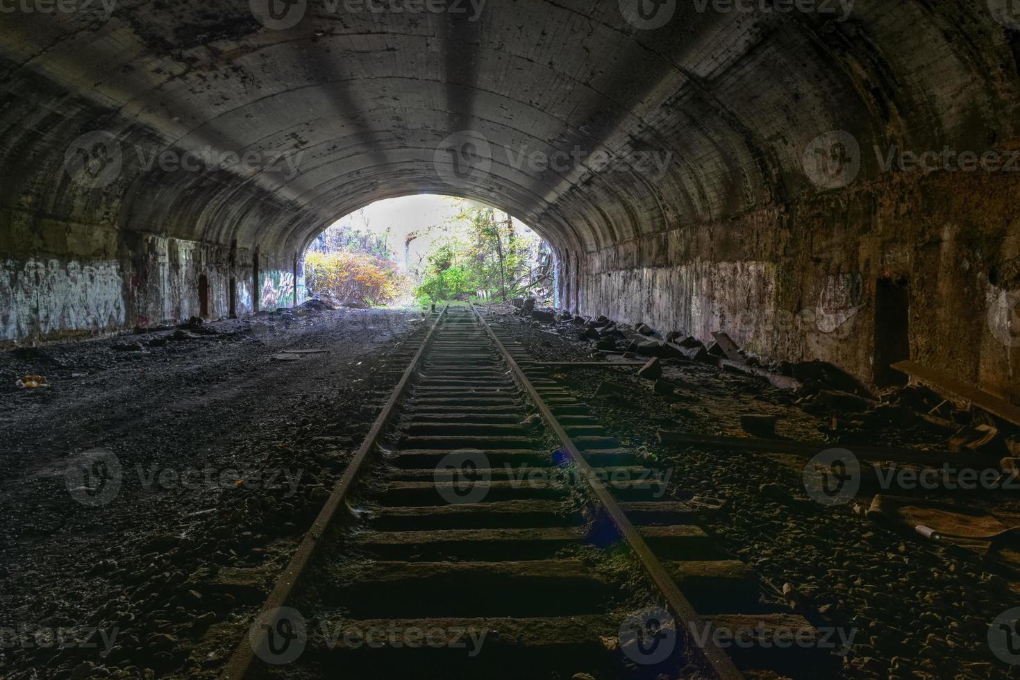 Train tracks going through the Bergen Arches of Jersey City, New Jersey. photo