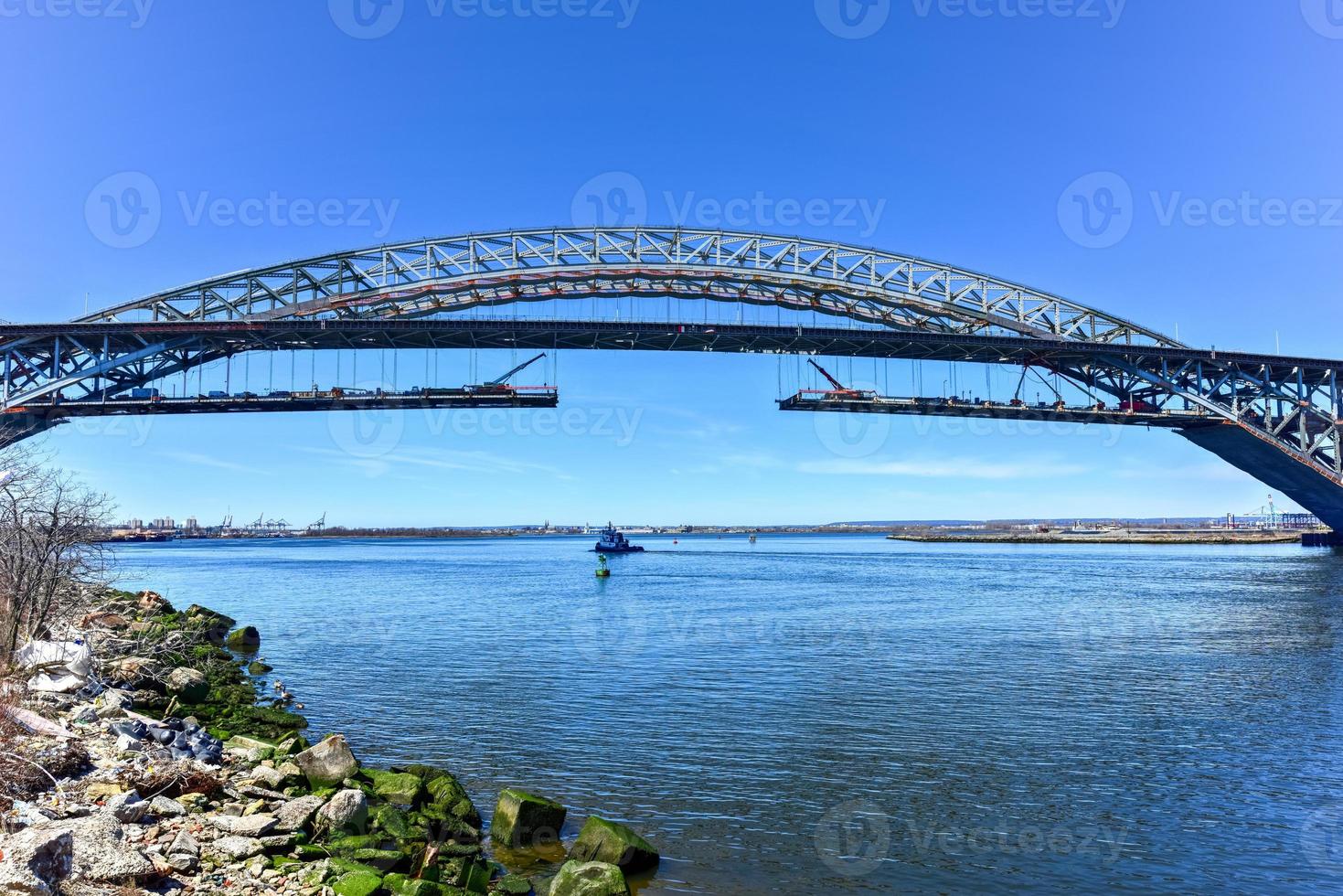 The Bayonne Bridge from Staten Island, New York. The Bayonne Bridge is the 5th longest steel arch bridge in the world, spans the Kill Van Kull and connects Bayonne, NJ with Staten Island, NY. photo