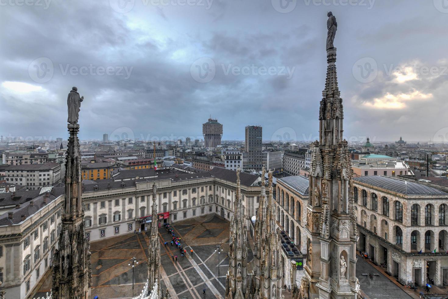 Milan Cathedral, Duomo di Milano, one of the largest churches in the world, on Piazza Duomo square in the Milan city center in Italy. photo