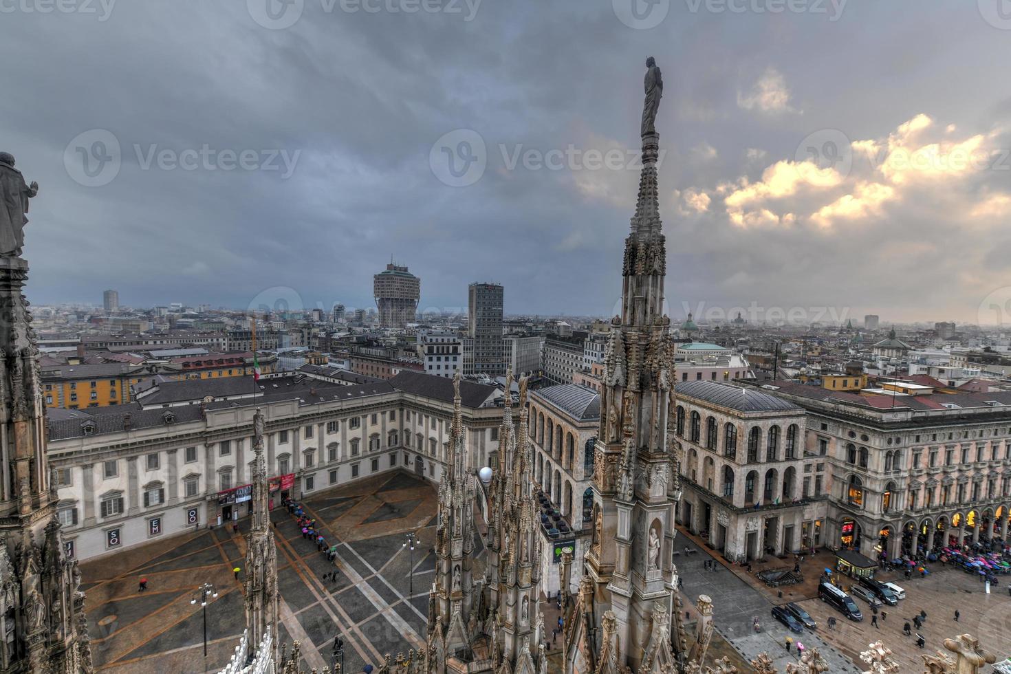 Milan Cathedral, Duomo di Milano, one of the largest churches in the world, on Piazza Duomo square in the Milan city center in Italy. photo