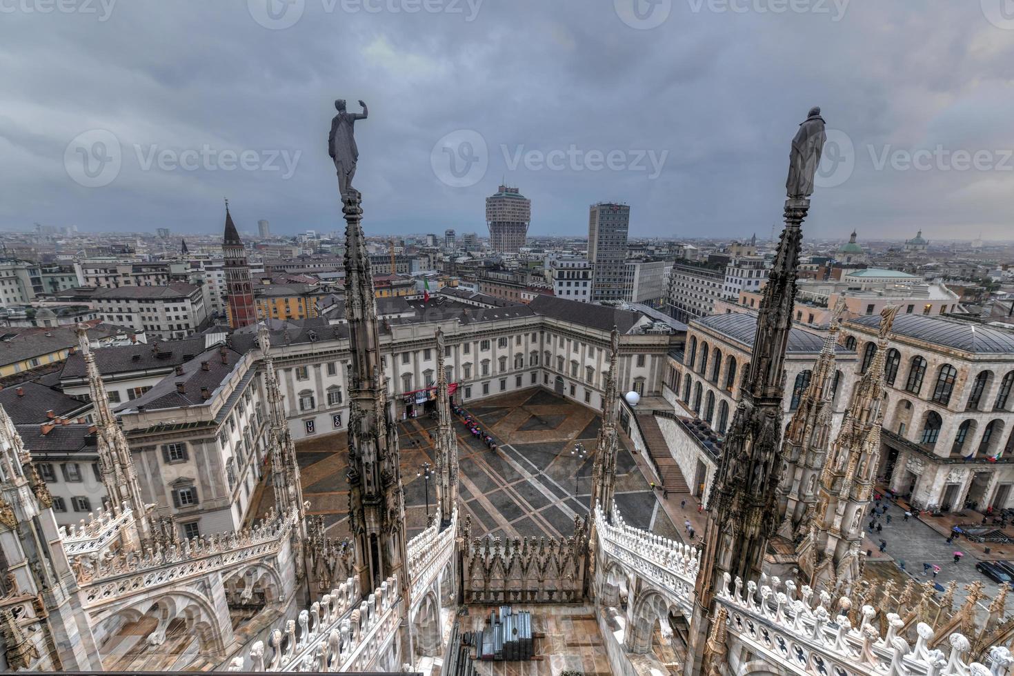 Milan Cathedral, Duomo di Milano, one of the largest churches in the world, on Piazza Duomo square in the Milan city center in Italy. photo