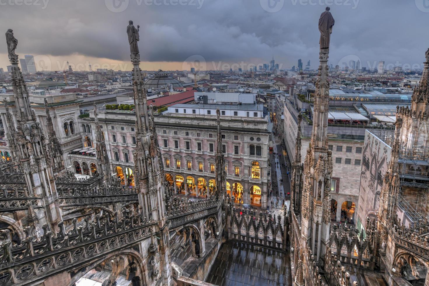 Milan Cathedral, Duomo di Milano, one of the largest churches in the world, on Piazza Duomo square in the Milan city center in Italy. photo