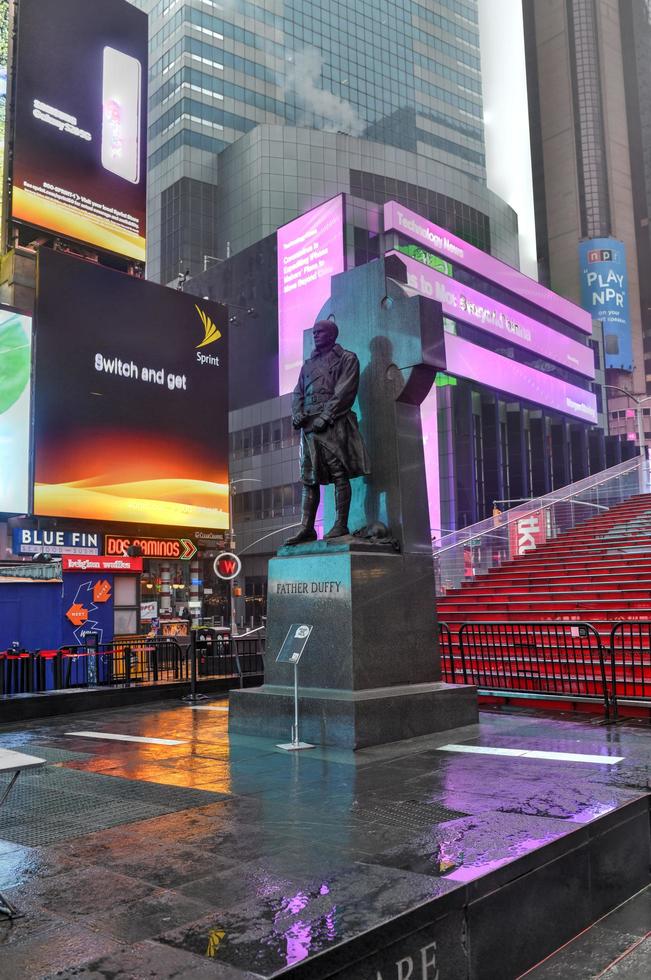 New York City - March 29, 2020 -  No crowds in Times Square after self-quarantine and social distancing was put in place in New York City to slow the spread of the covid-19 pandemic. photo