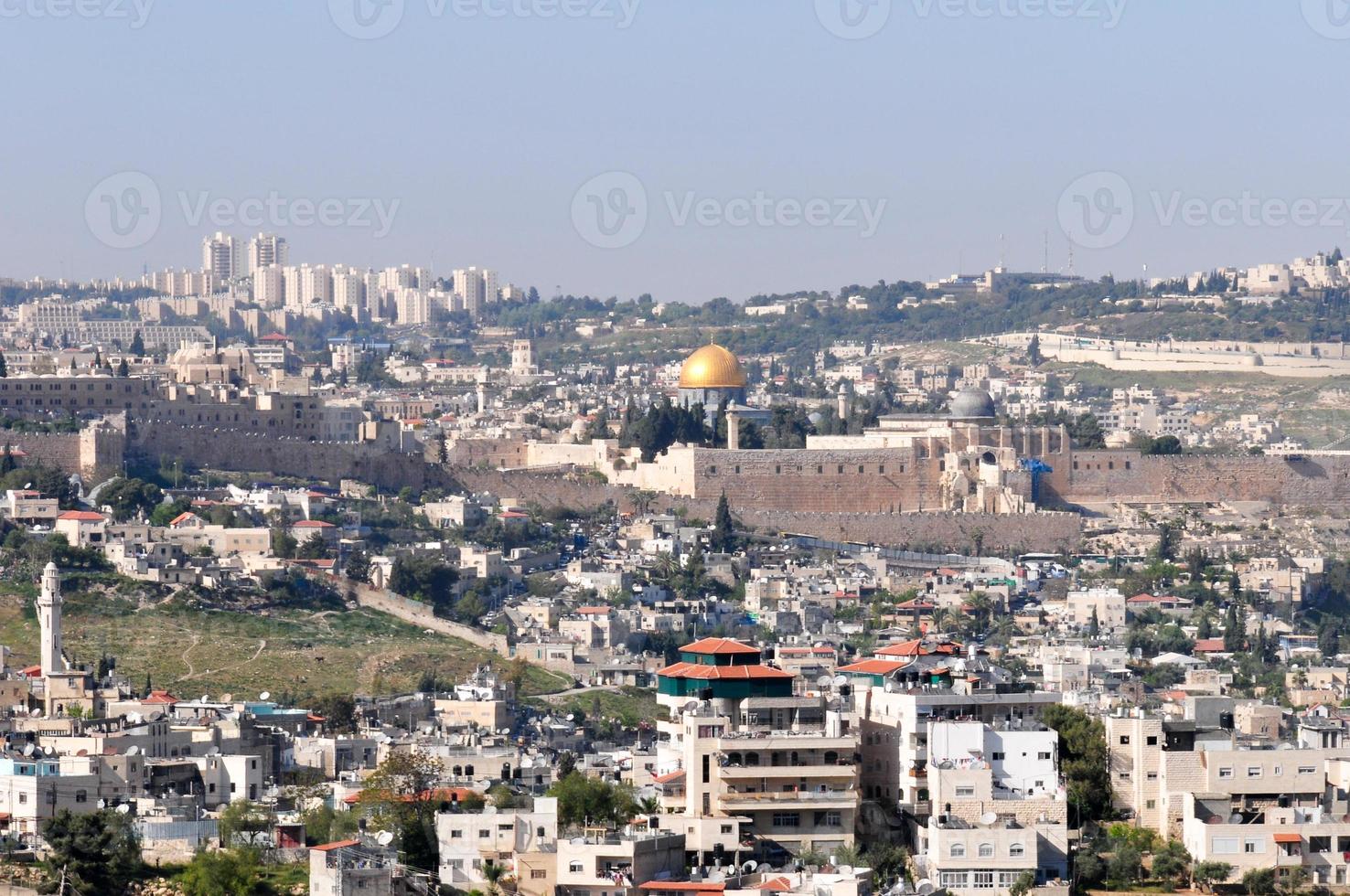 Panoramic view on white old Jerusalem. The Armon Hanatziv Promenade overlooks most of Jerusalem and offers a beautiful view of the city. photo