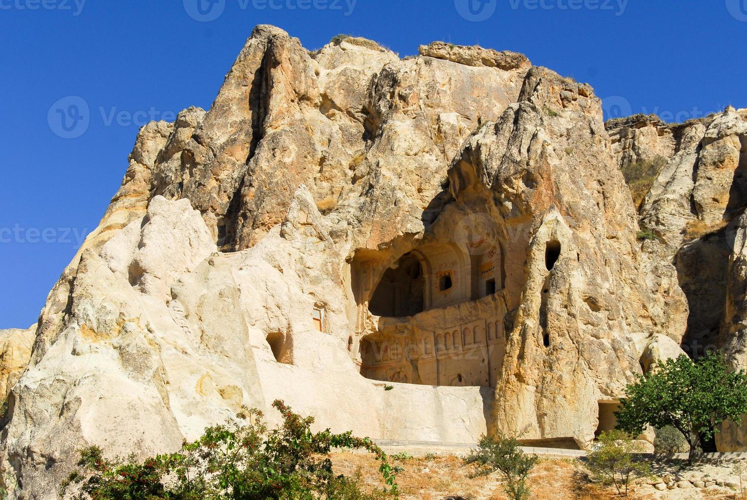 Goreme village, Turkey. Rural Cappadocia landscape. Stone houses in Goreme, Cappadocia. Countryside lifestyle. photo