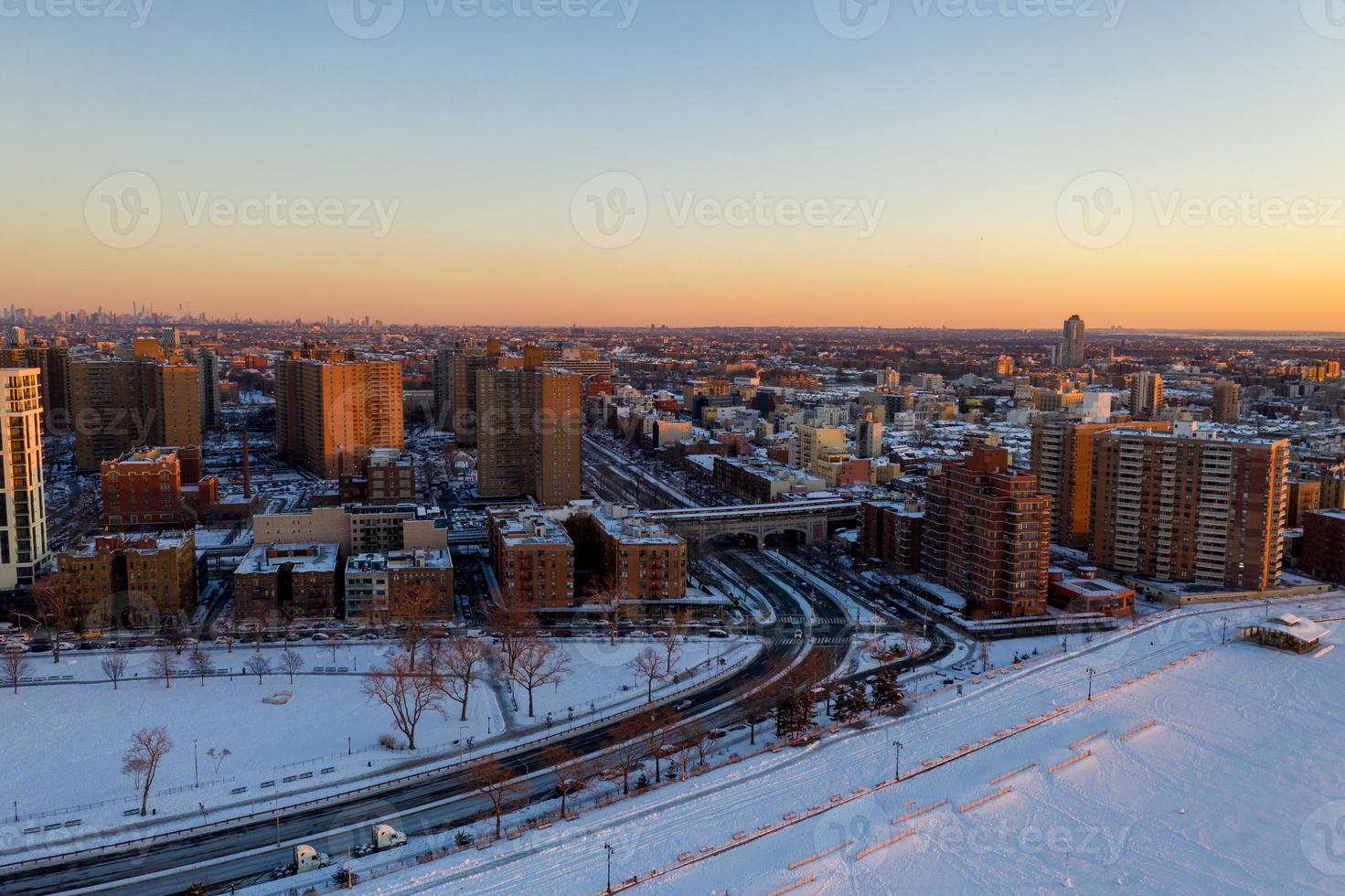 Aerial view of a snow covered Coney Island Beach during the winter at sunrise in Brooklyn, New York photo