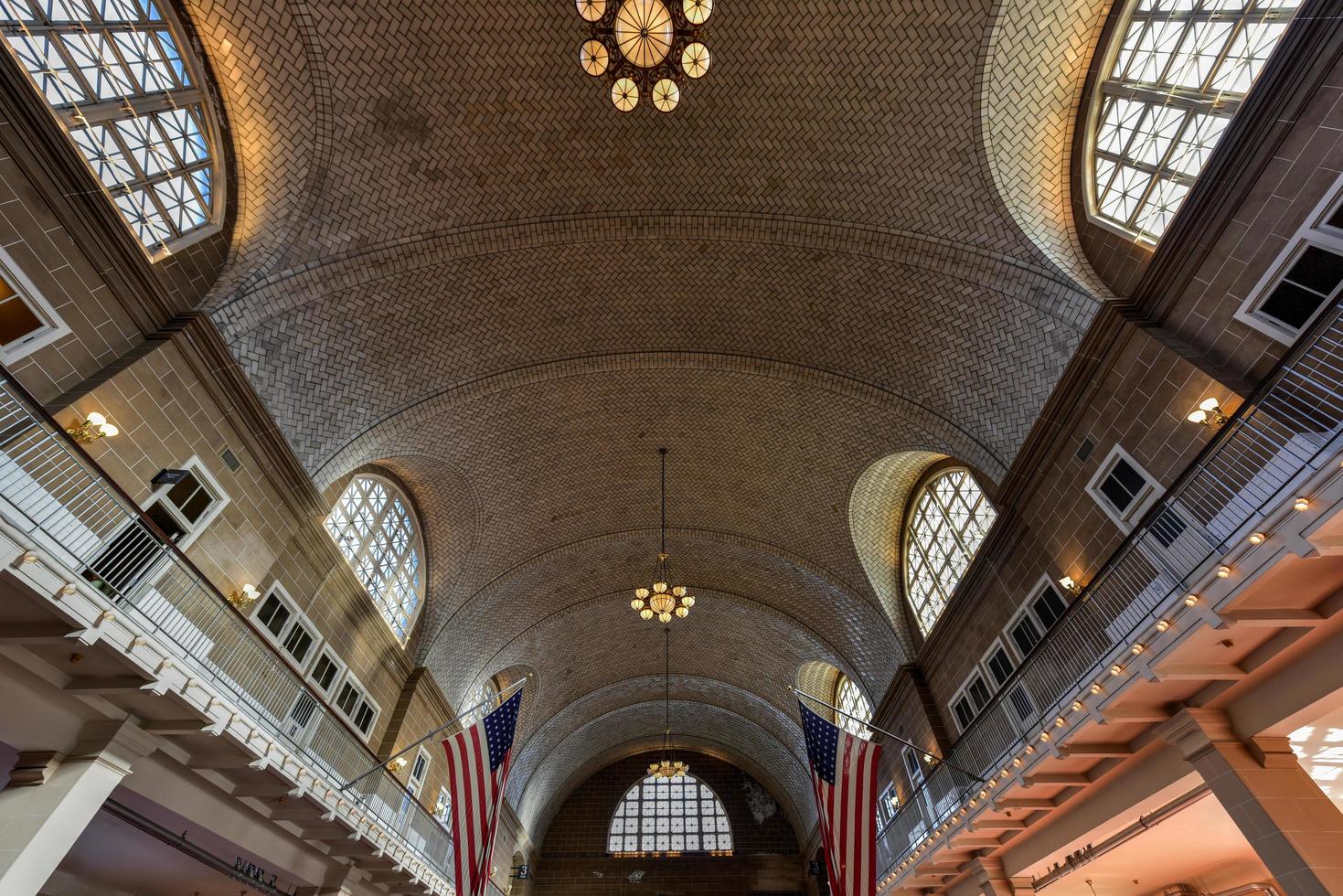 The  Registry Room or Great Hall at Ellis Island National Park in New York, 2022 photo