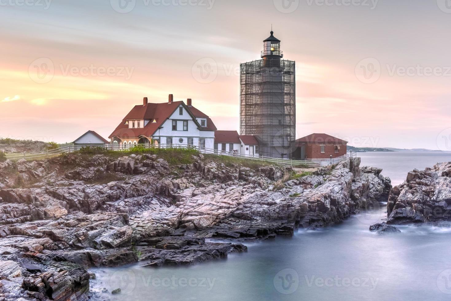 Portland Head Lighthouse in Cape Elizabeth, Maine. It is a historic lighthouse in Cape Elizabeth, Maine. Completed in 1791, it is the oldest lighthouse in the state of Maine. photo