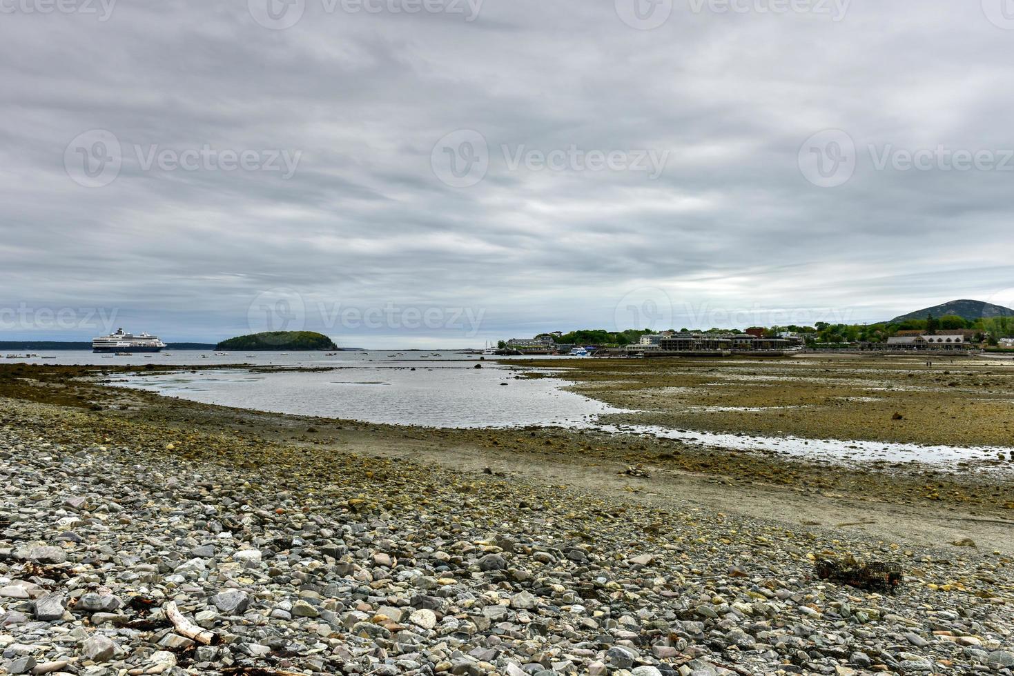 Dirt path to Bar Island at low-tide at Bar Harbor in Acadia National Park, Maine photo