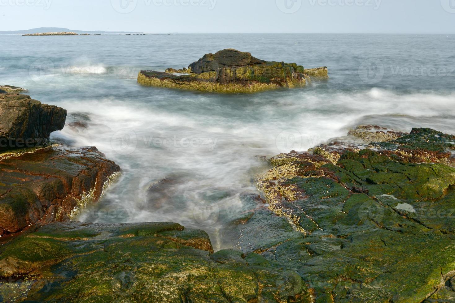 The rocky coast in Acadia National Park, Maine near Thunder Hole in the summer. photo