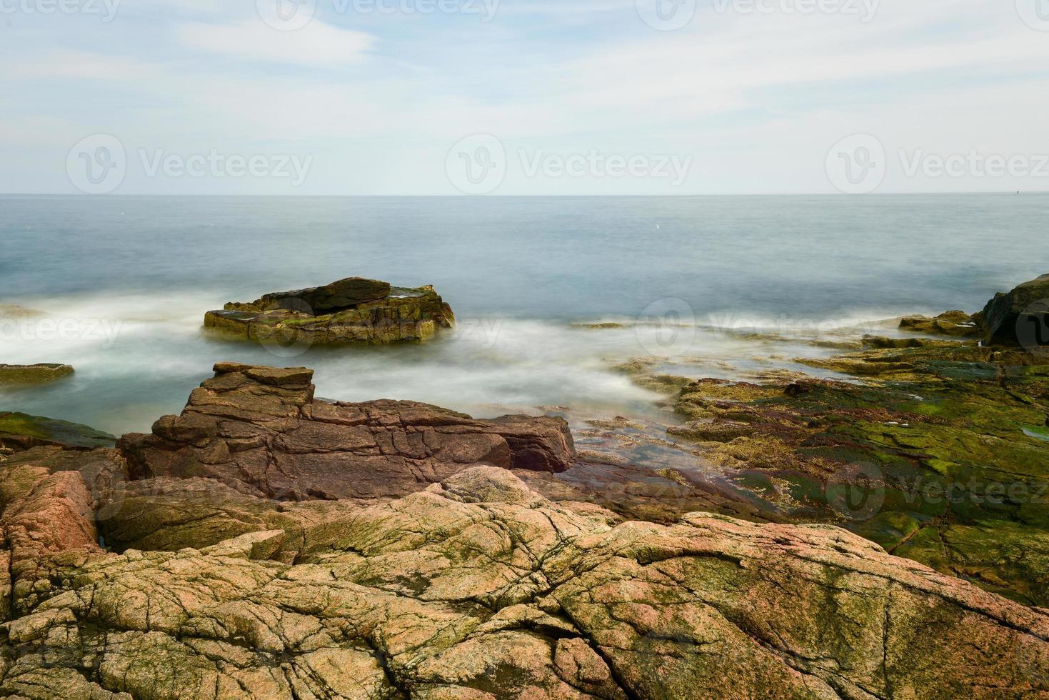 The rocky coast in Acadia National Park, Maine near Thunder Hole in the summer. photo