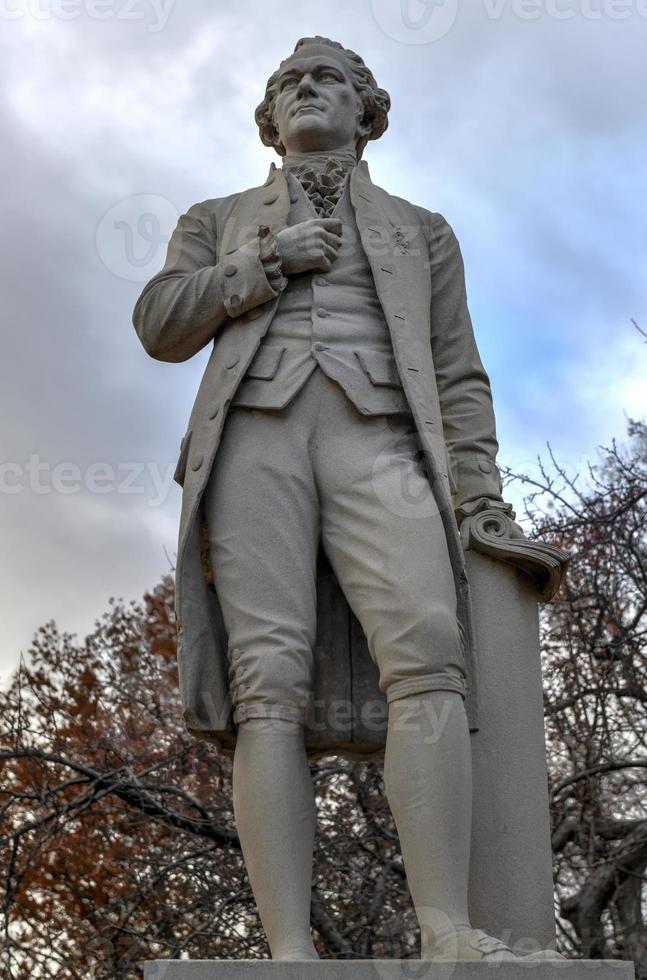 Alexander Hamilton statue in Central Park, New York City. It is carved from solid granite by Carl H. Conrads, was donated to Central Park in 1880 by one of Alexander Hamiltons sons, John C. Hamilton. photo