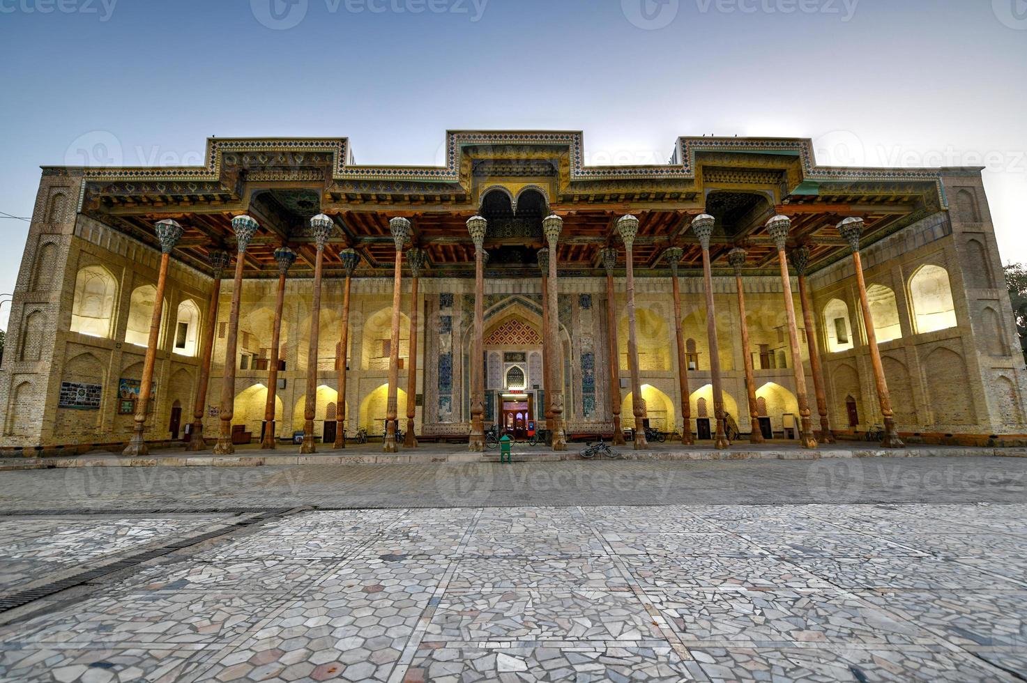 Bolo-Hauz mosque built in the 17th century, with wooden carved columns in Bukhara,  Uzbekistan. photo