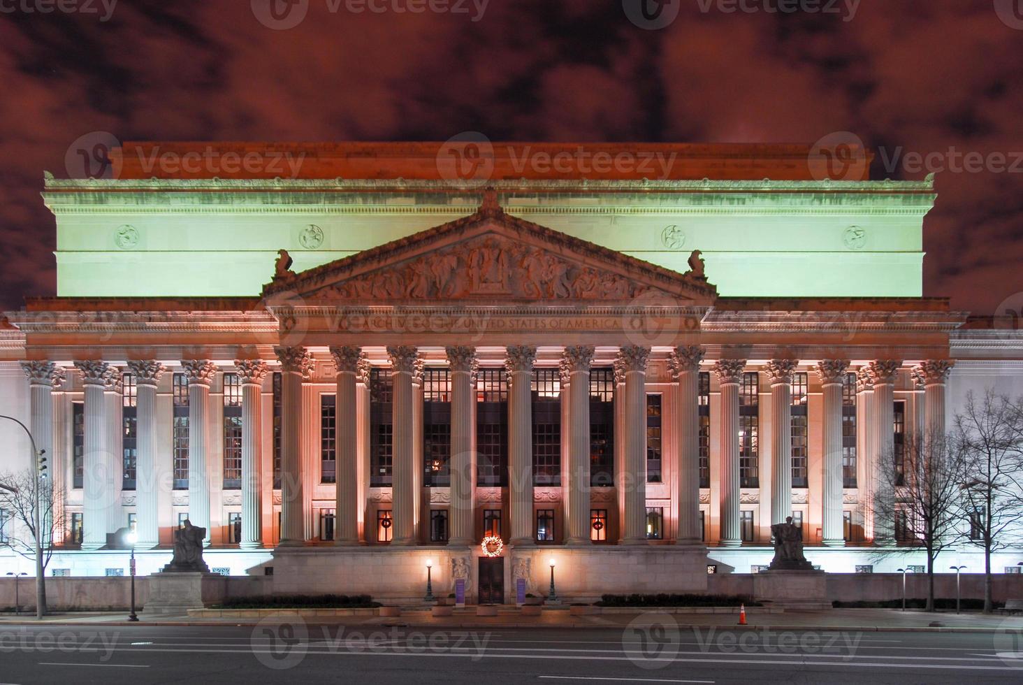 National Archives facade at night in Washington DC, United States photo