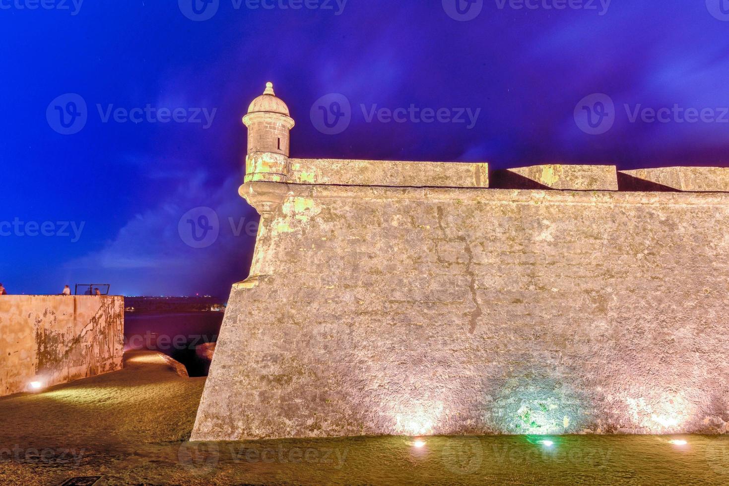 Castillo San Felipe del Morro also known as Fort San Felipe del Morro or Morro Castle at dusk. It is a 16th-century citadel located in San Juan, Puerto Rico. photo