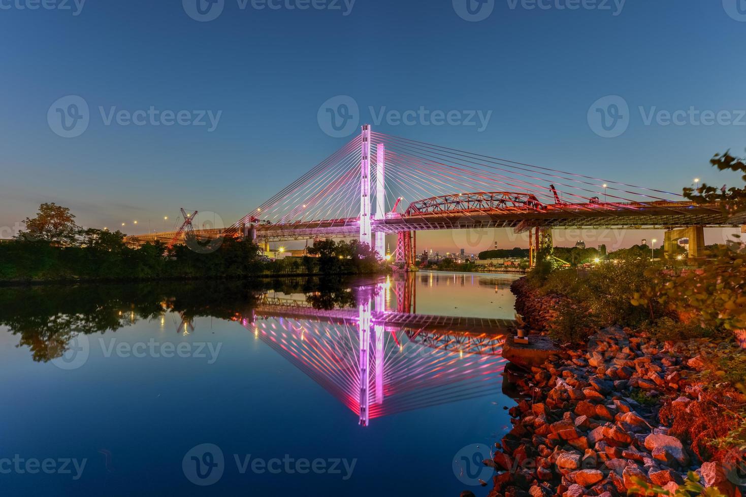 New and old Kosciuszko bridges joining Brooklyn and Queens in New York City across Newtown Creek. The new bridge is a cable-stayed bridge while the old bridge from 1939 is truss bridge. photo