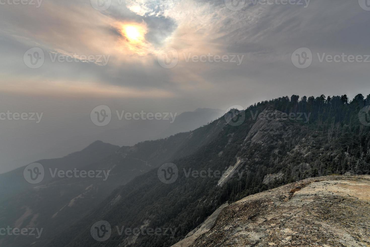 View from Moro Rock at Sequoia National Park with hazy mountains in background following California wildfires. photo