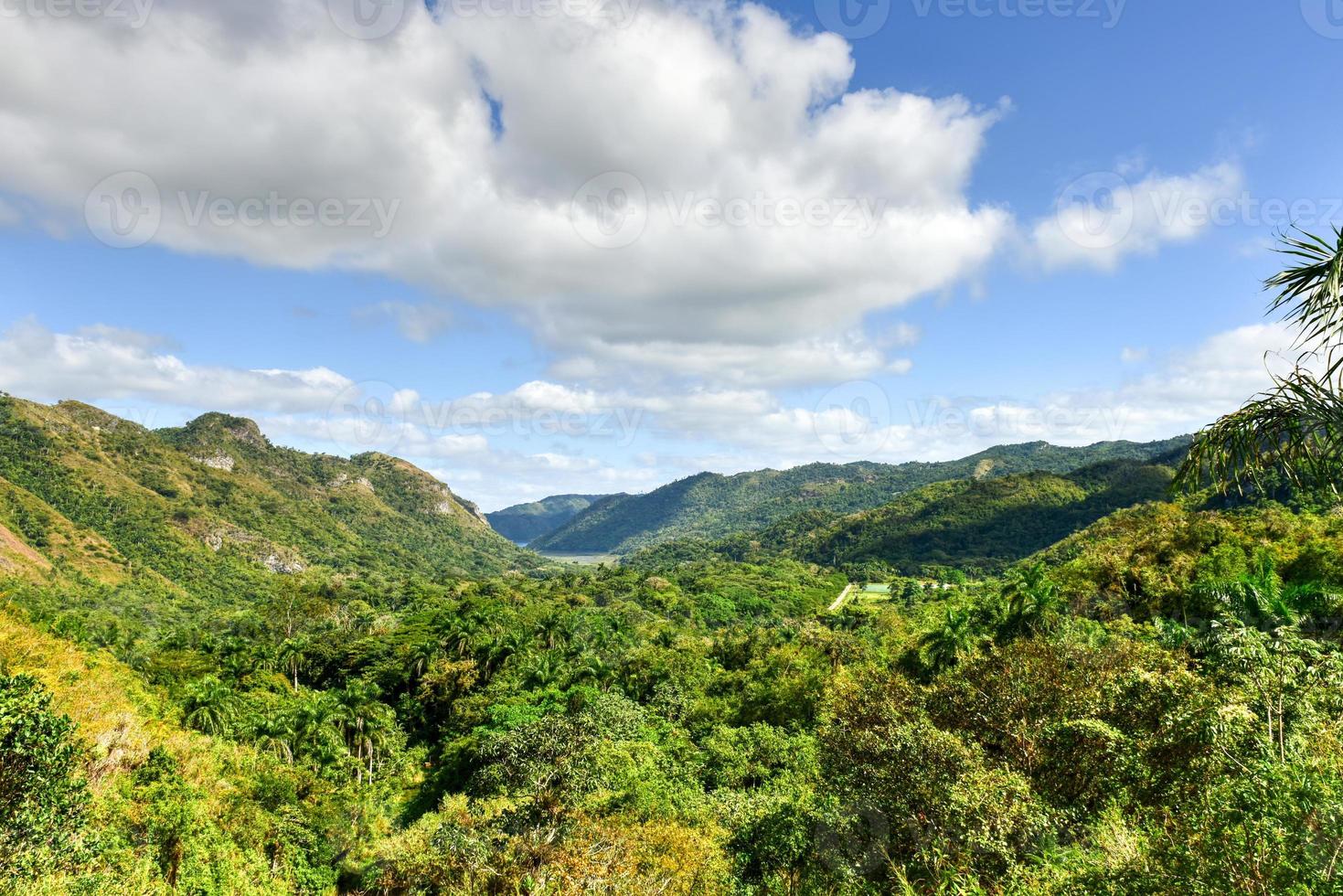 El Nicho Waterfalls in Cuba. El Nicho is located inside the Gran Parque Natural Topes de Collantes, a forested park that extends across the Sierra Escambray mountain range in central Cuba. photo