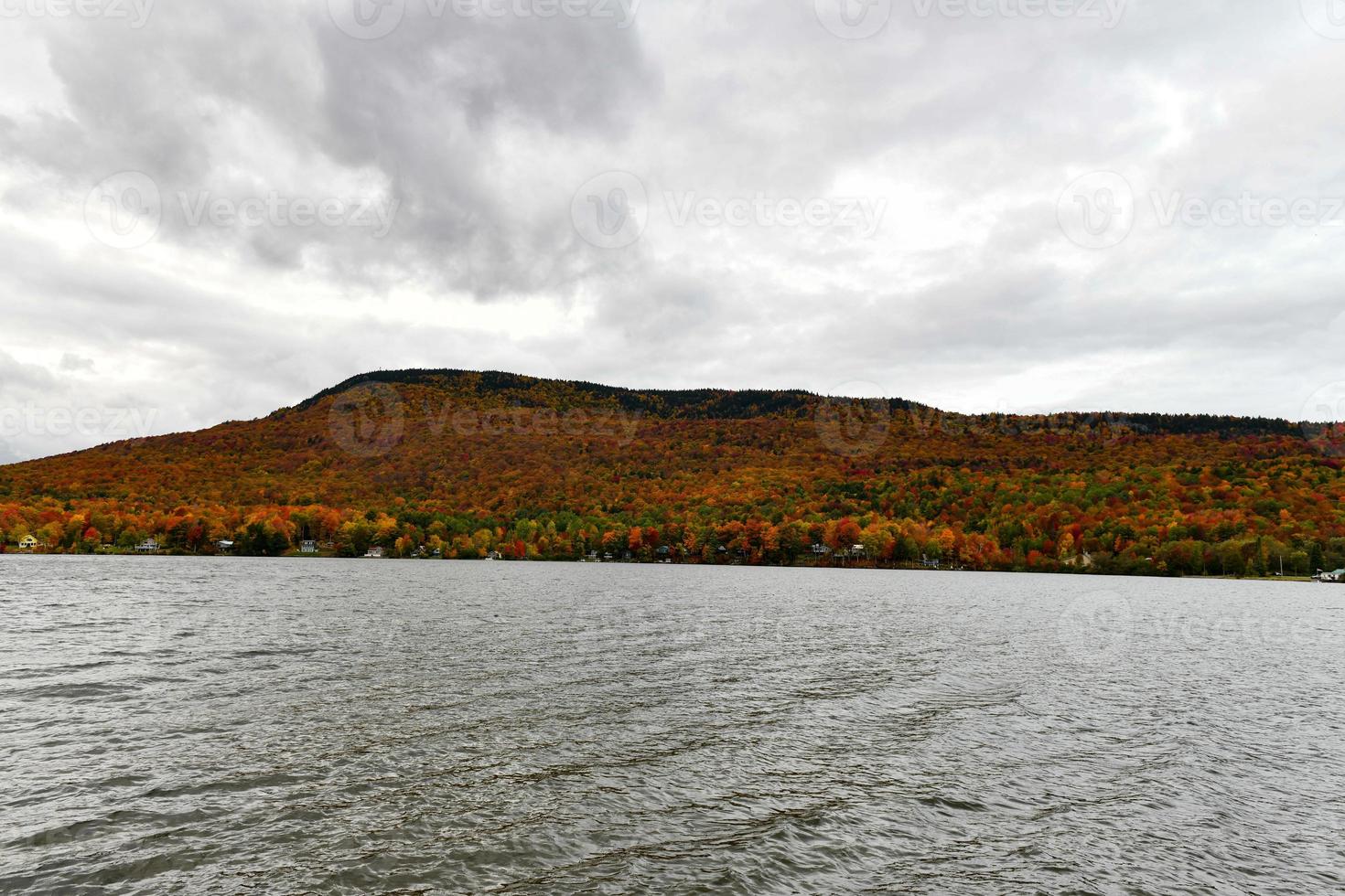 Overlooking of Lake Elmore State Part With Beautiful Autumn Foliage and Water reflections at Elmore, Vermont, USA photo