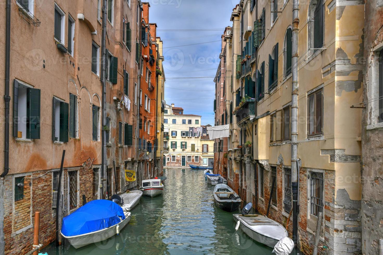 Architecture along the many canals of Venice, Italy. photo