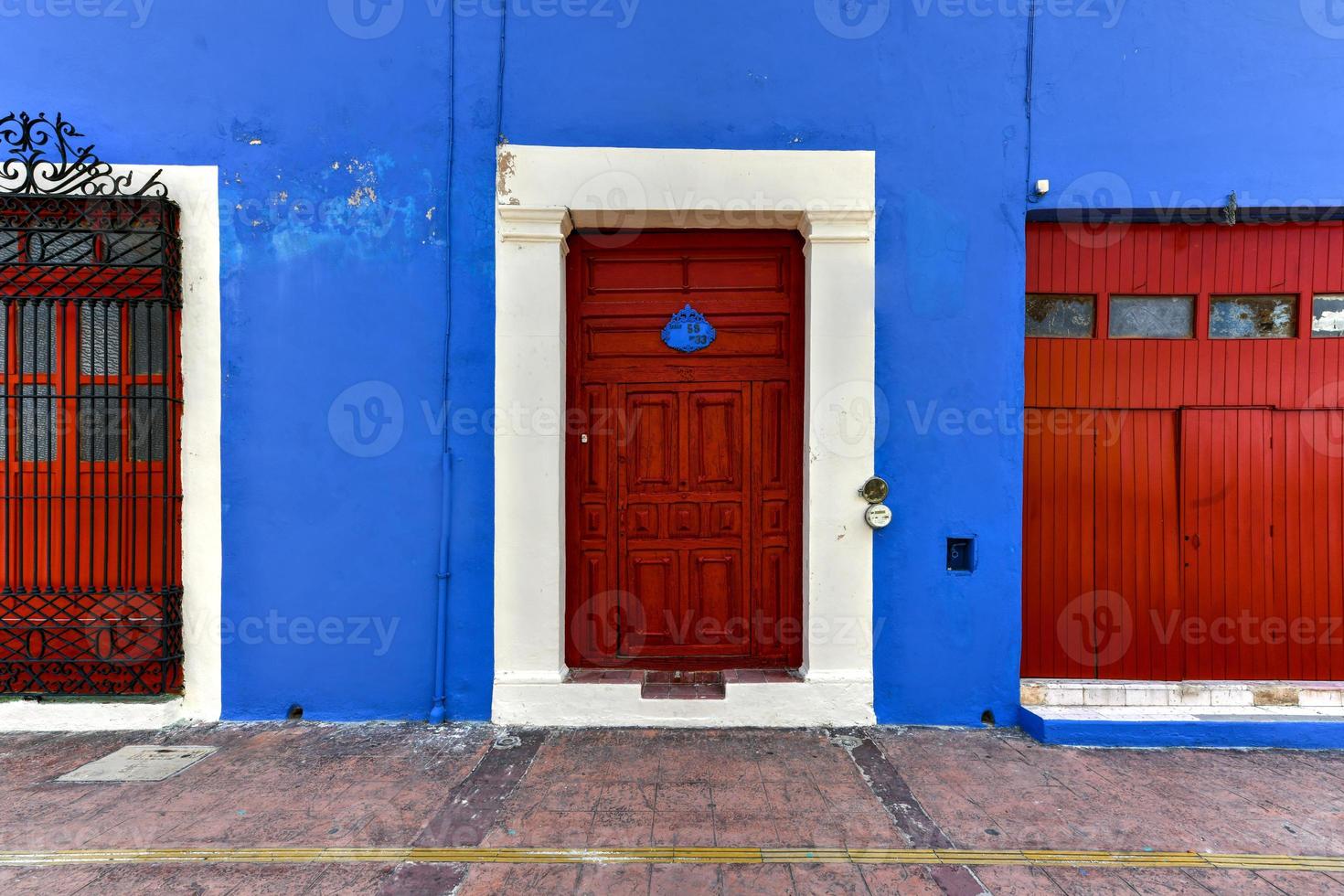 Bright colors in colonial houses on a sunny day in Campeche, Mexico. photo
