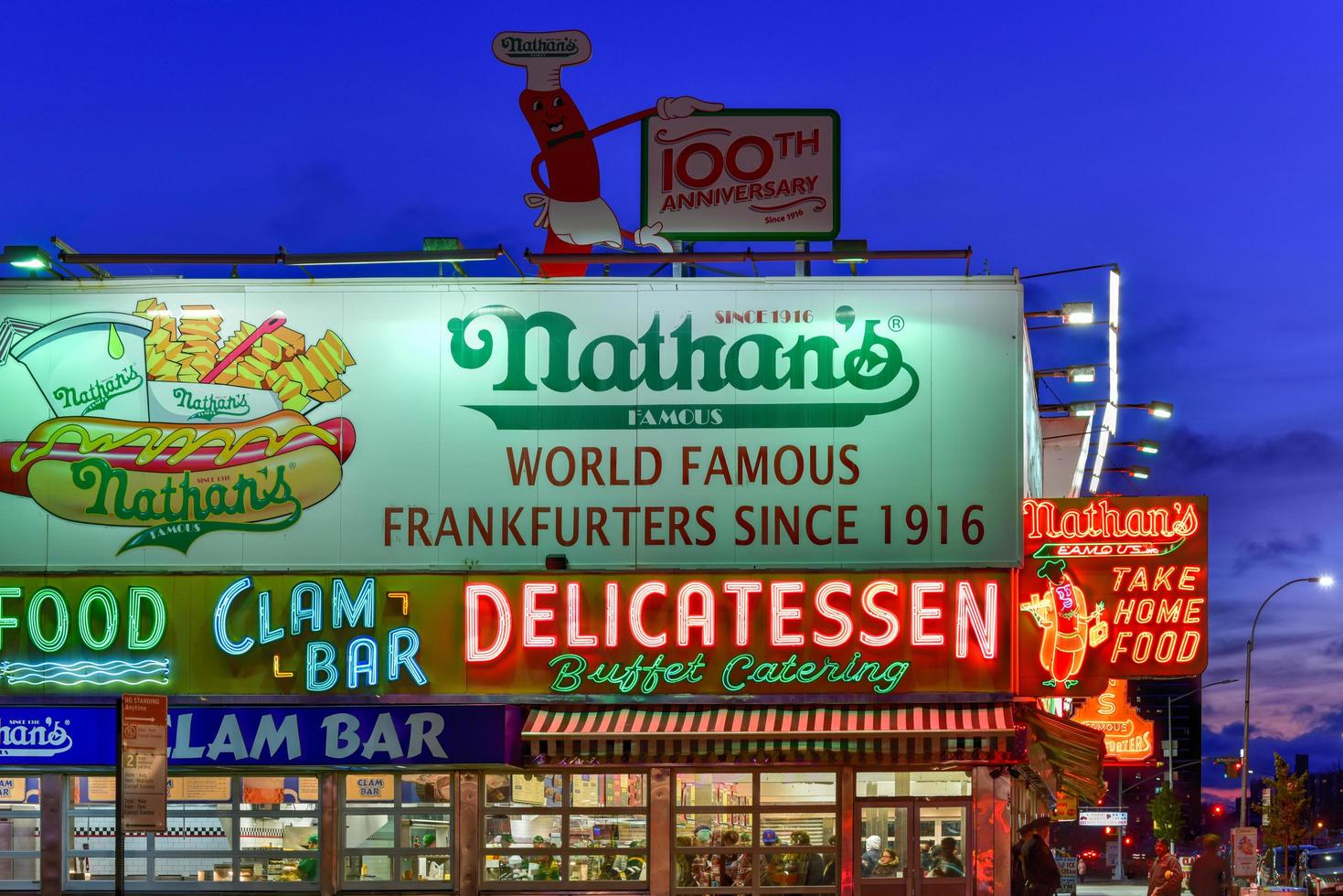 Brooklyn, New York - March 26, 2016 -  Nathan's Famous Hotdogs is a historic landmark and tradition at Coney Island in Brooklyn, New York. photo