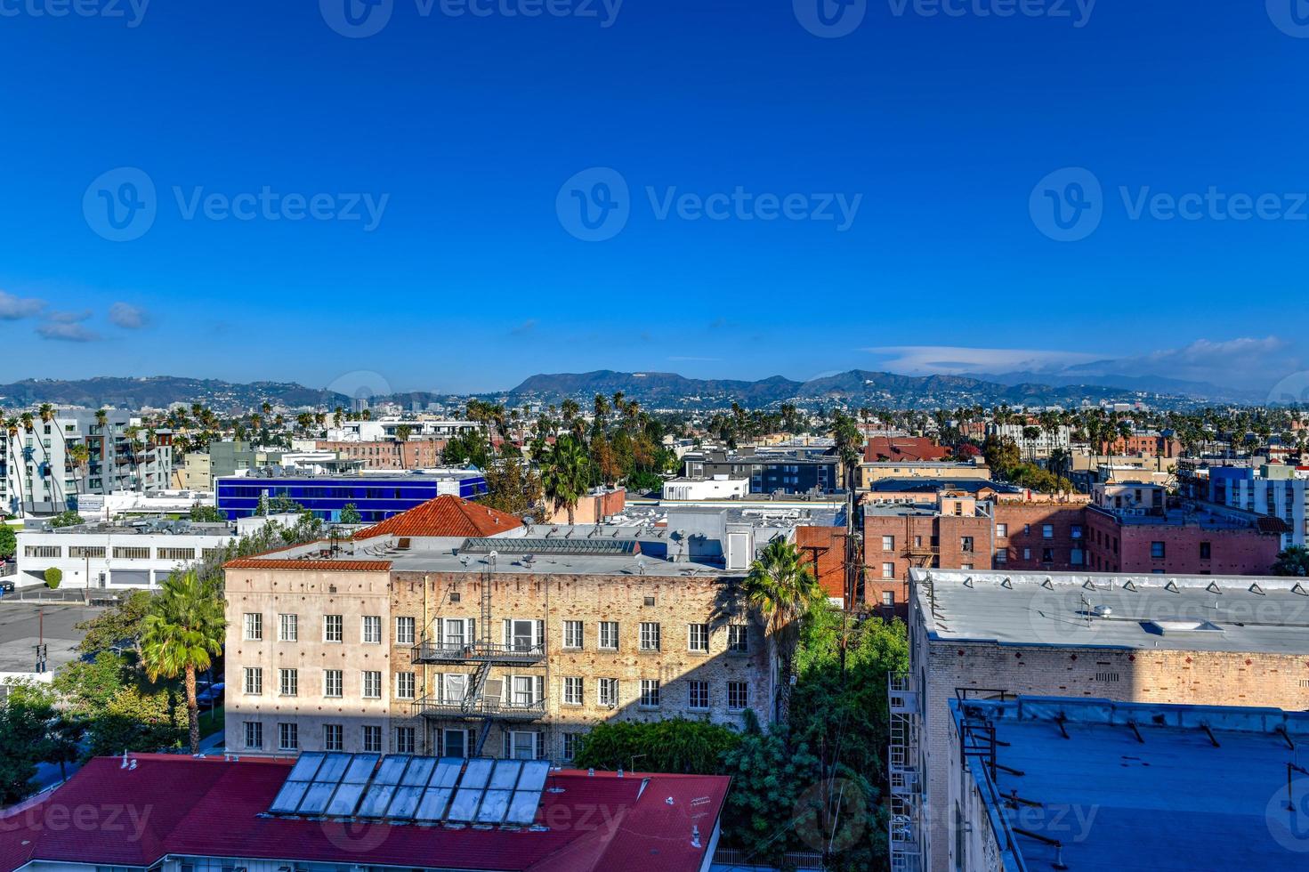 Aerial view of the Los Angeles skyline looking towards Hollywood Hills in California. photo