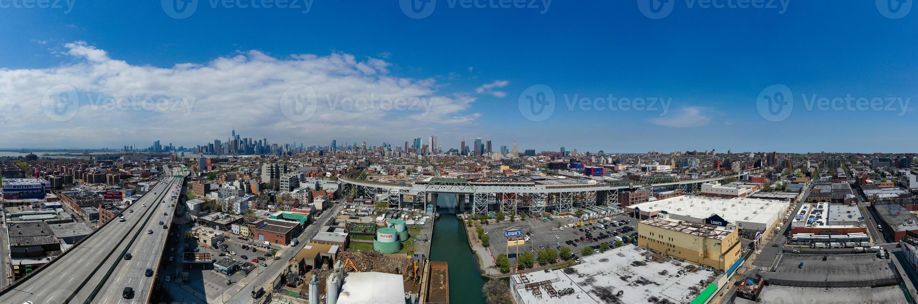 Panoramic view of the Gowanus Canal in Brooklyn with the Gowanus Expressway and Manhattan in the background. photo