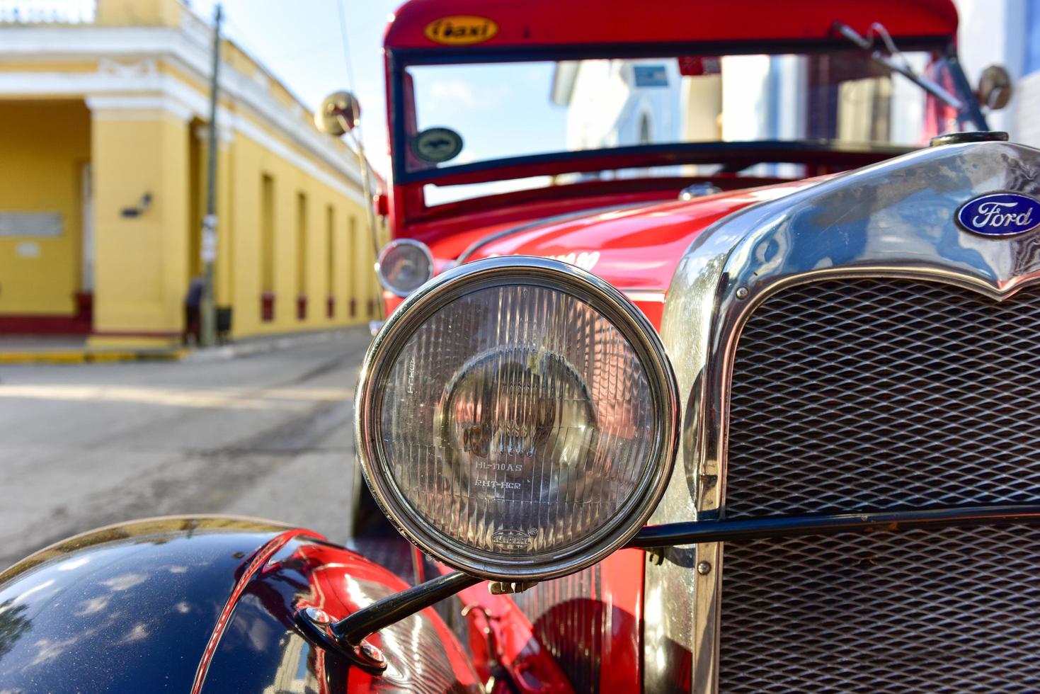 Trinidad, Cuba - January 12, 2017 -  Classic Ford in the old part of the streets of Trinidad, Cuba. photo