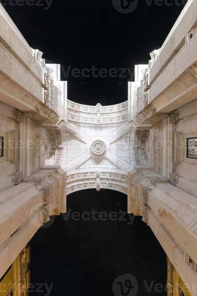 Augusta Street Triumphal Arch in the Commerce Square, Praca do Comercio or Terreiro do Paco at night in Lisbon, Portugal. photo