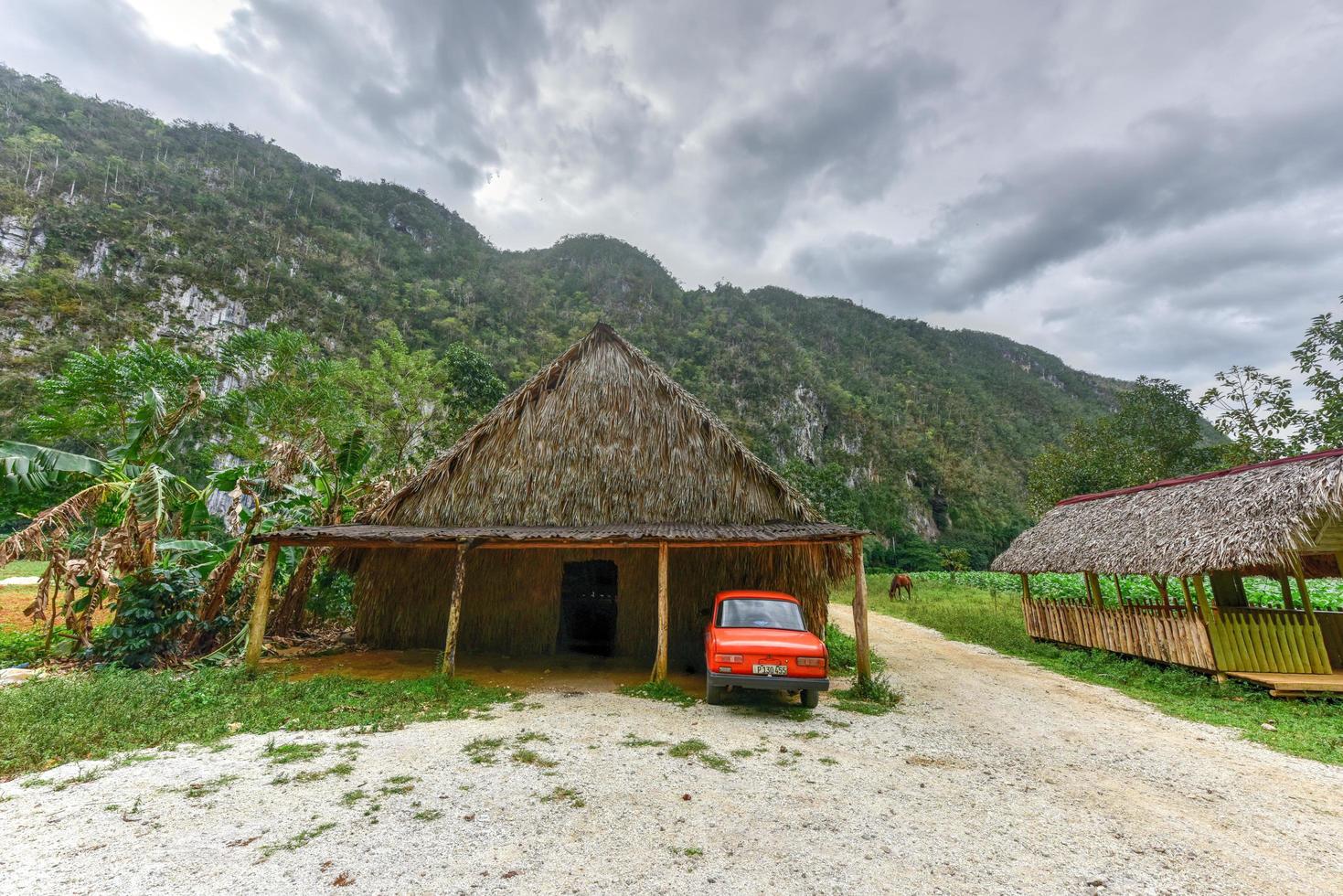 Vinales, Cuba - January 10, 2017 -  Old Russian Lada car parked in a hut in the Vinales valley, north of Cuba. photo