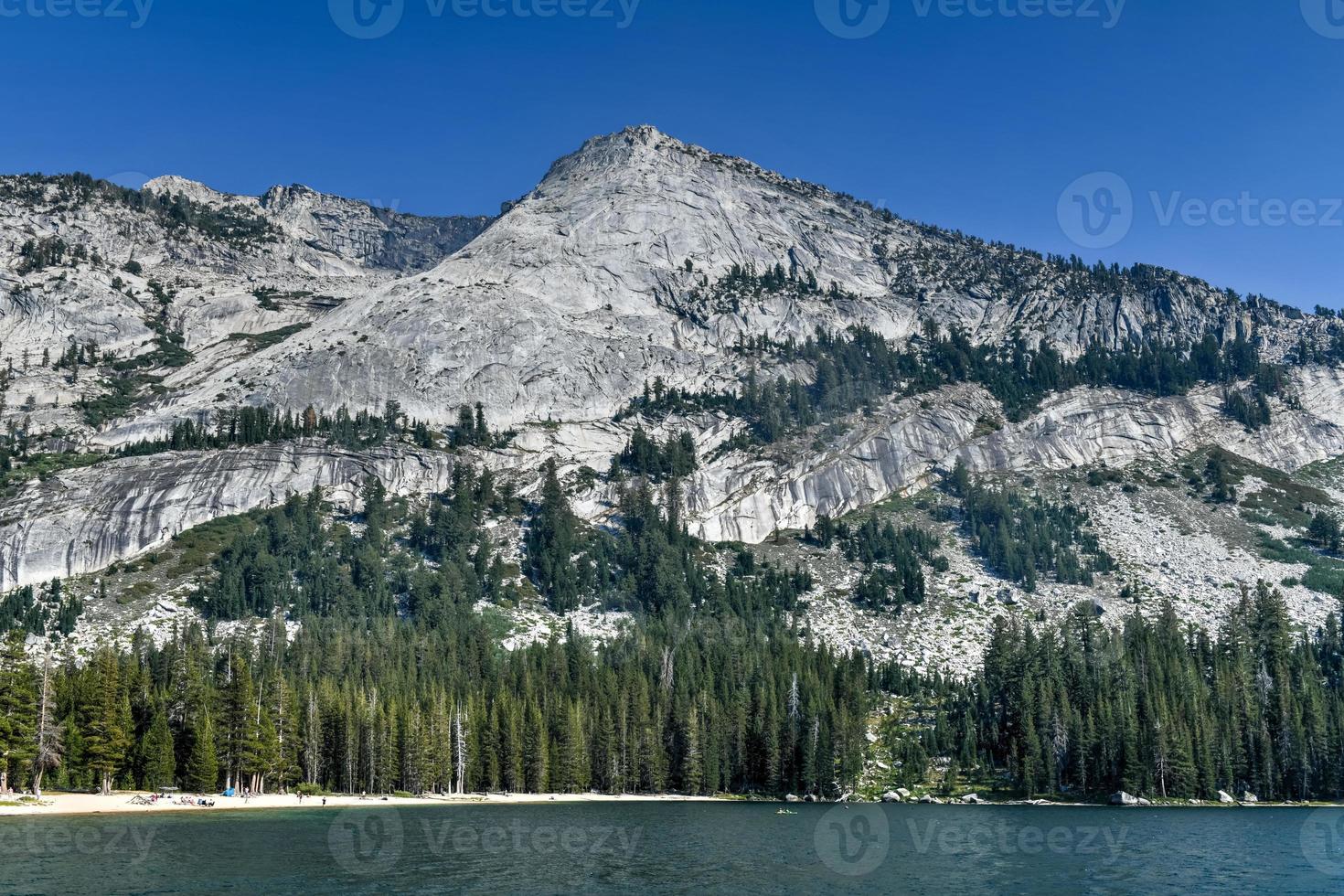 Views of Tenaya Lake, an alpine lake in Yosemite National Park, located at an elevation of 2,484 m photo
