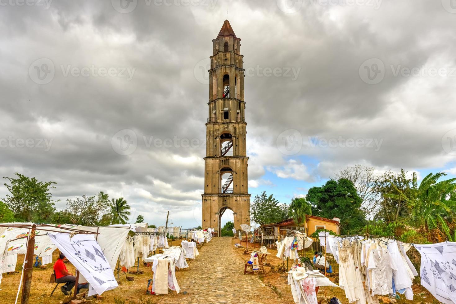 Historic slave watch tower in Manaca Iznaga, Valle de los Ingenios, Trinidad, Cuba. The Manaca Iznaga Tower is the tallest lookout tower ever built in the Caribbean sugar region. photo