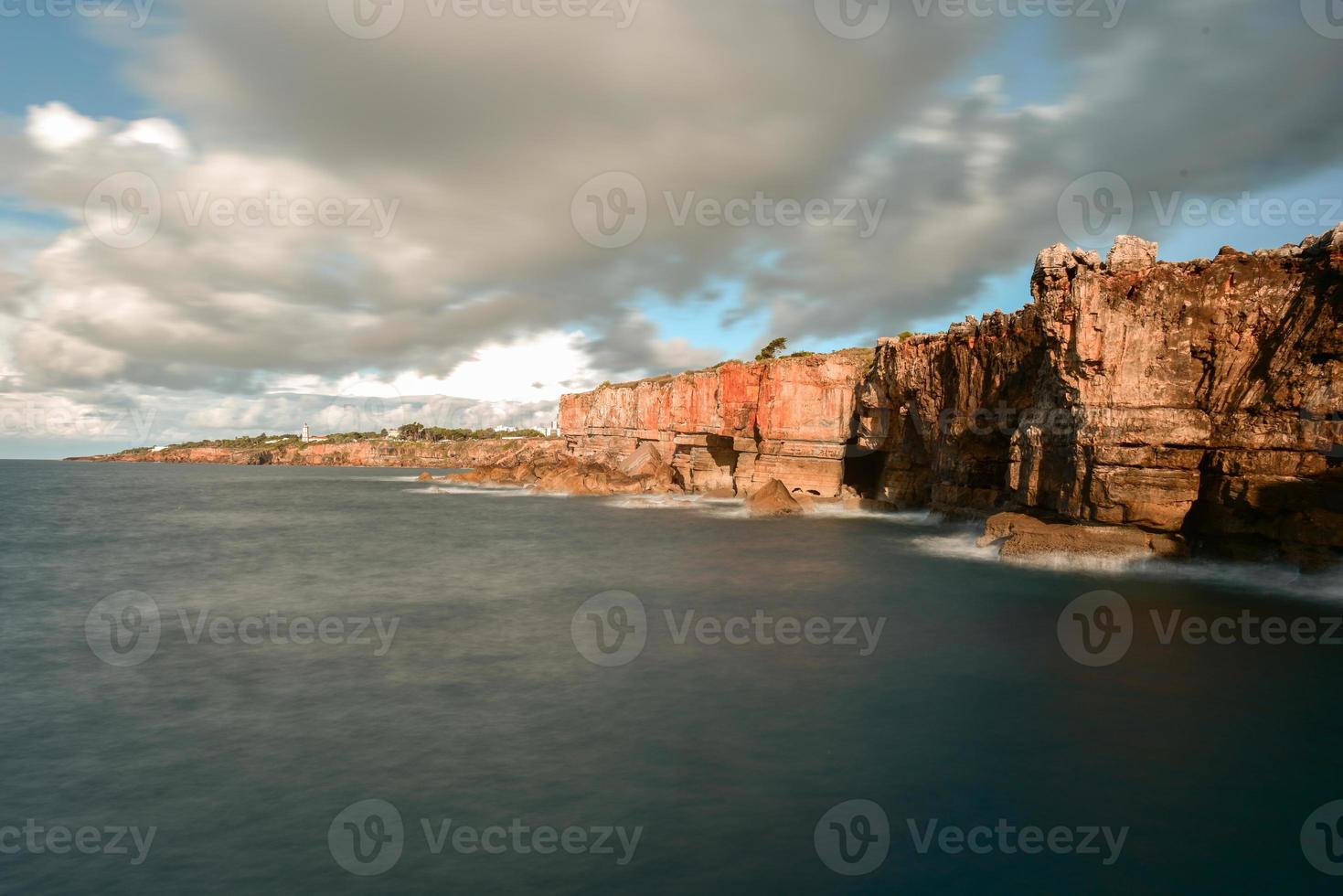 Seaside cliffs along the Atlantic Ocean close to the Portuguese city of Cascais, in the District of Lisbon. photo