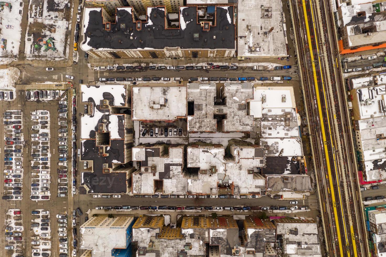 Aerial view of a snow covered roofs of buildings in Brighton Beach during the winter in Brooklyn, New York photo