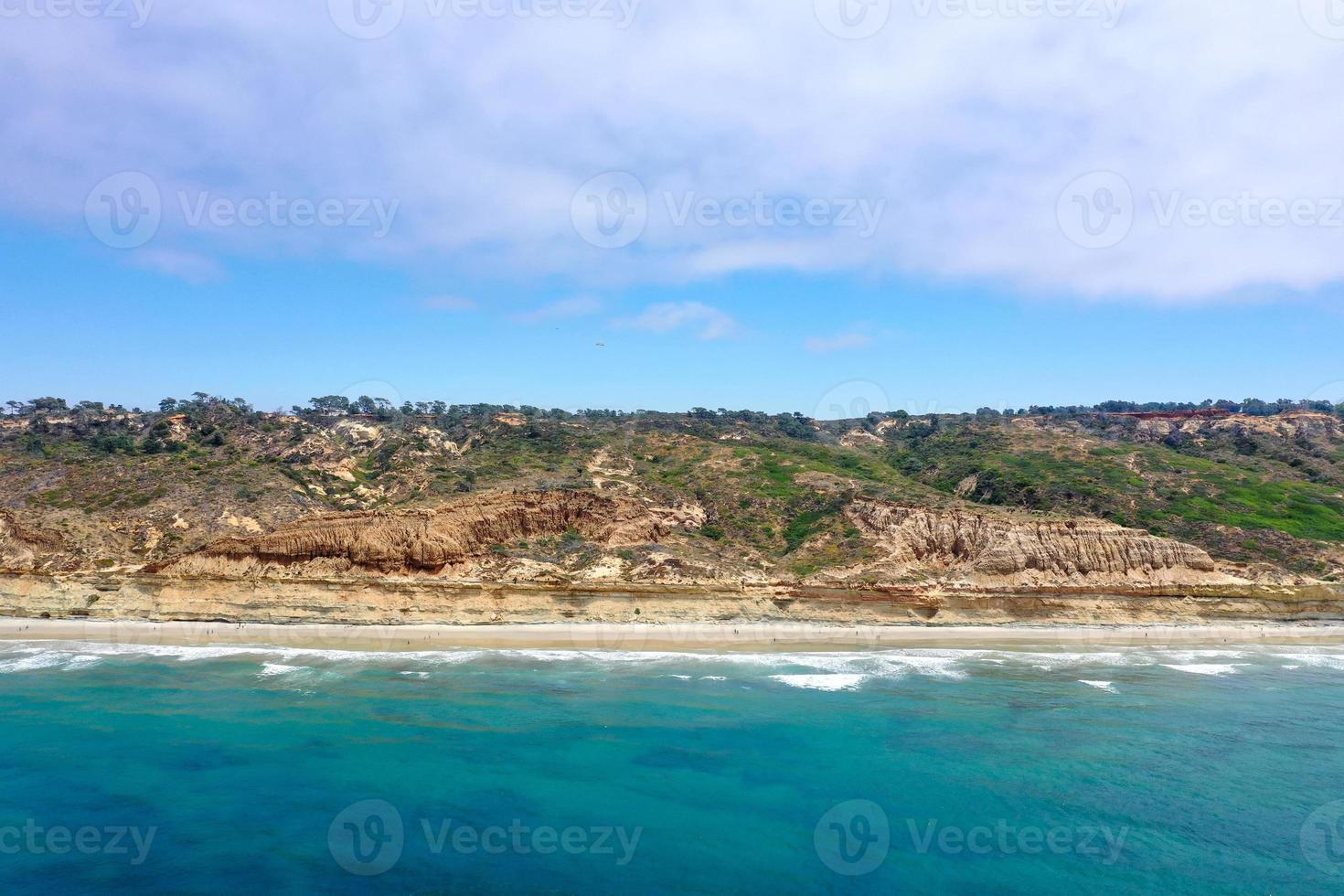 Aerial view along the Pacific Ocean of La Jolla Beach and Torrey Pines in San Diego, California. photo