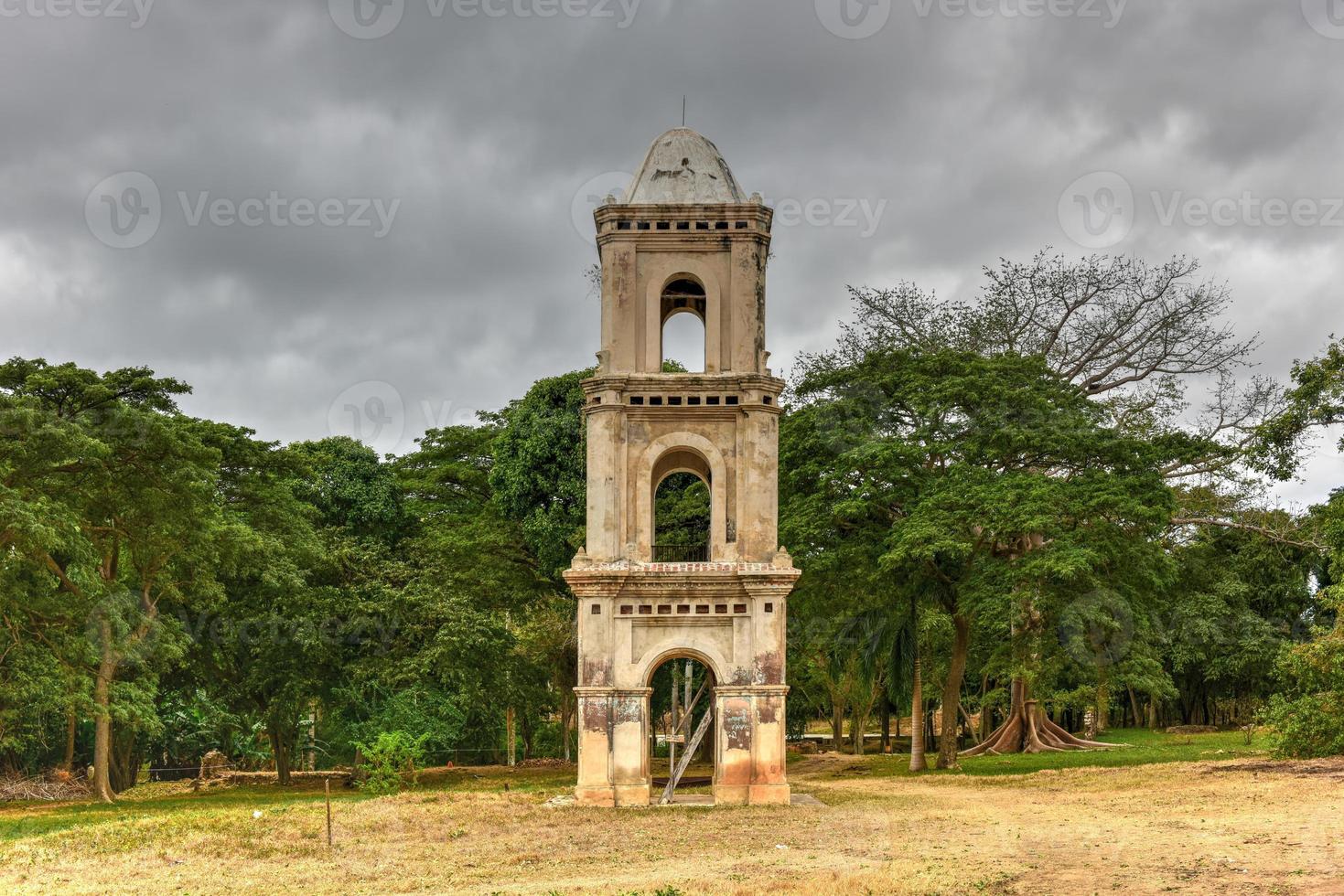 Ruins of the slave tower of the once grand sugar mill Ingenio San Isidro de Los Destiladeros in the Valle de los Ingenios, Trinidad, Cuba photo