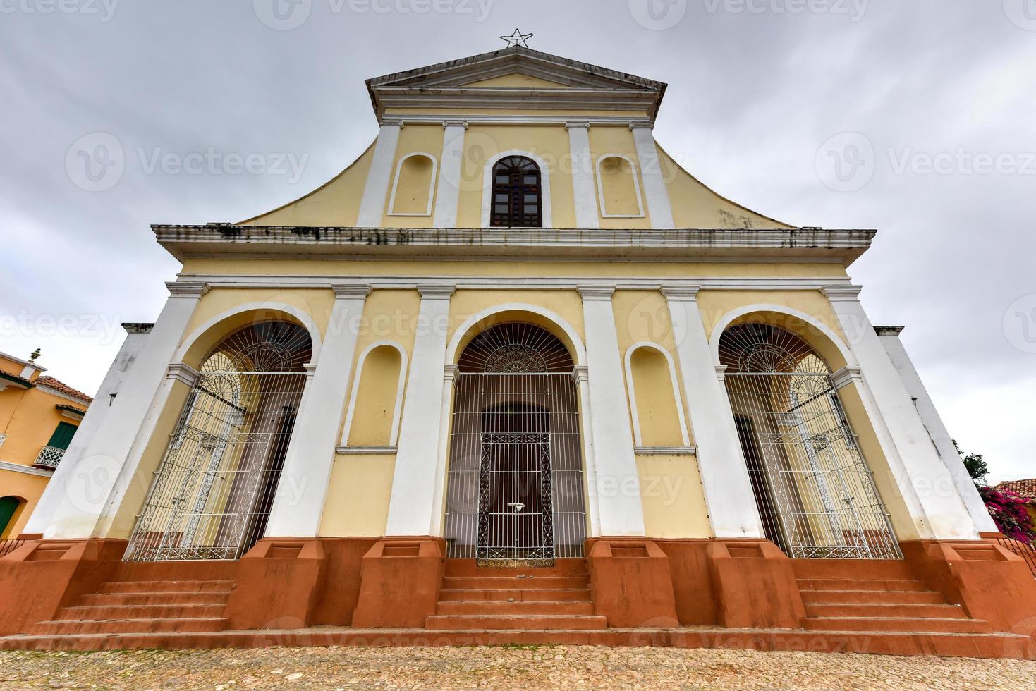 Holy Trinity Church in Trinidad, Cuba. The church has a Neoclassical facade and is visited by thousands of tourists every year. photo