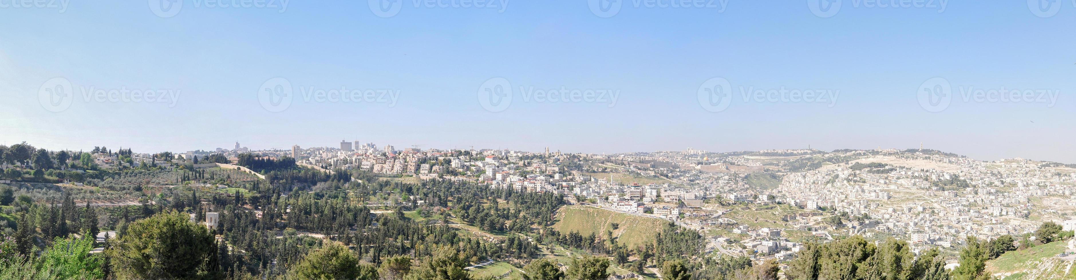 Panoramic view on white old Jerusalem. The Armon Hanatziv Promenade overlooks most of Jerusalem and offers a beautiful view of the city. photo