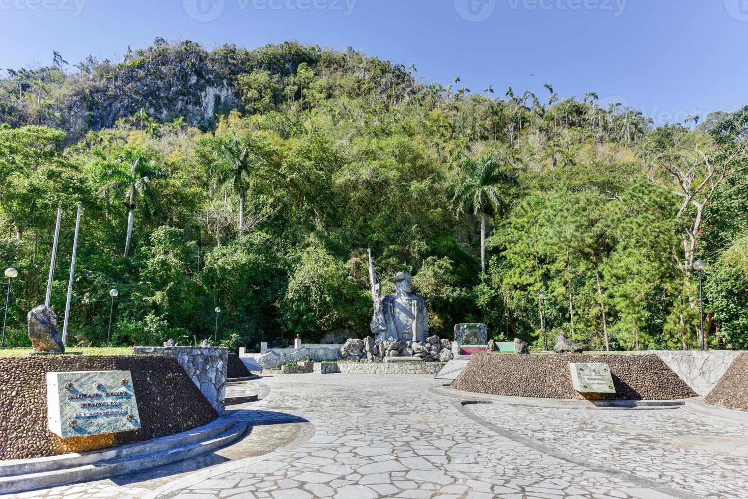 Memorial to Los Malagones from the community of El Moncada, the first rural militia in Cuba. It comprised 12 men who rooted out a counterrevolutionary band from the nearby mountains in 1959. photo