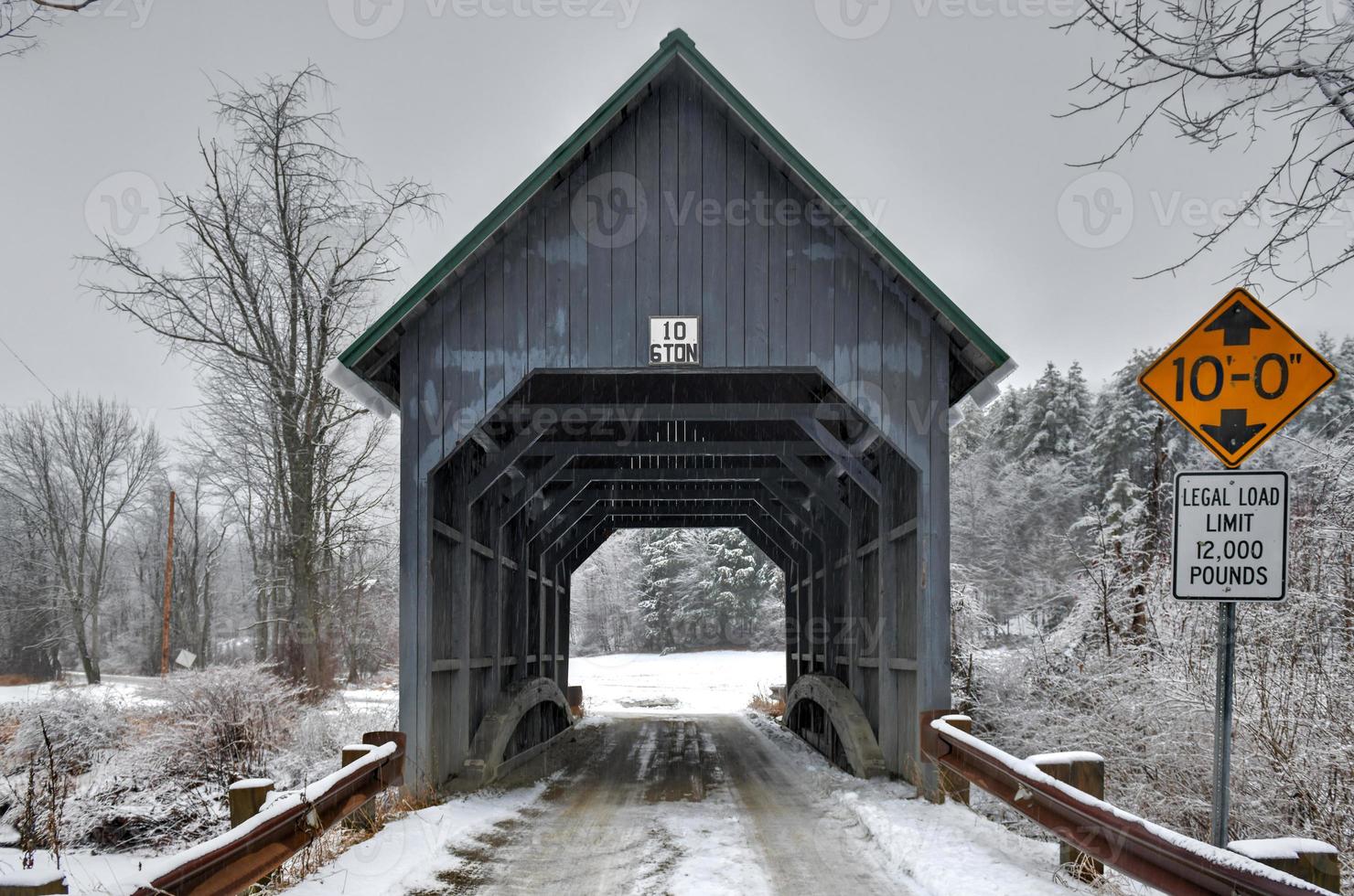 Best's Covered Bridge in Brownsville, Vermont during the winter. photo