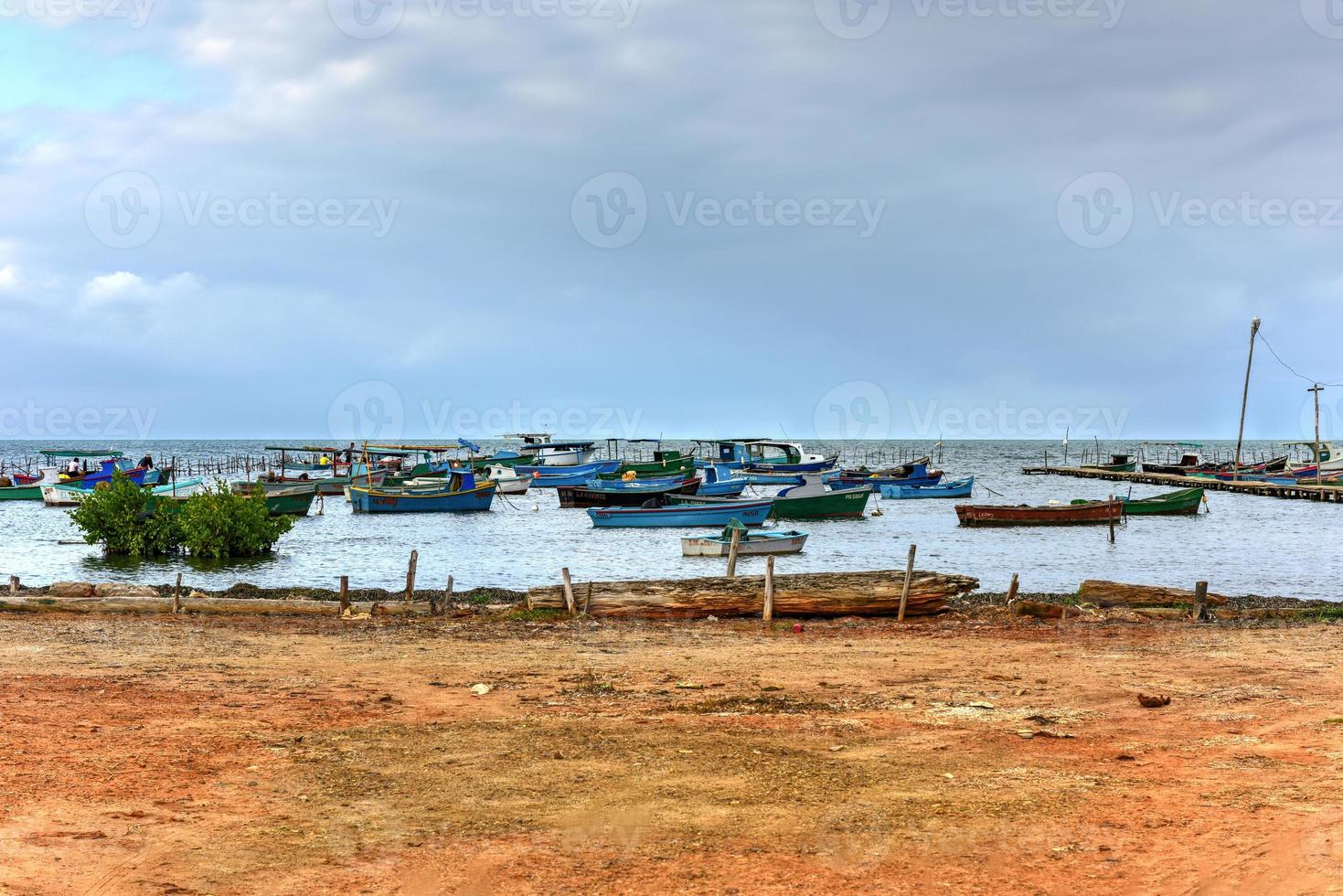 Fishing boats in the northern town of Puerto Esperanza, Cuba. photo