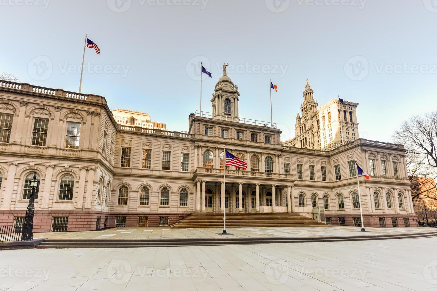 New York City Hall, the seat of New York City government, located at the center of City Hall Park in the Civic Center area of Lower Manhattan, between Broadway, Park Row, and Chambers Street. photo