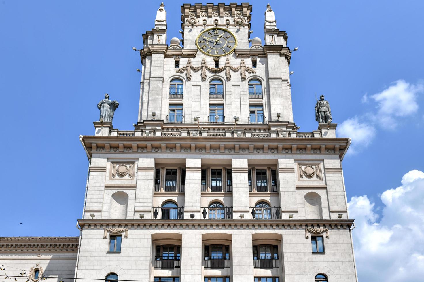 Gates of Minsk, two symmetrical high towers in the style of Stalin classicism. This style combines the elements of baroque, late classicism and art deco, 2022 photo