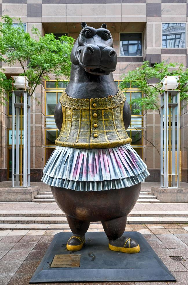 New York City, New York - June 11, 2020 -  Hippo Ballerina made of bronze and copper statue outside in Manhattan, New York City. photo