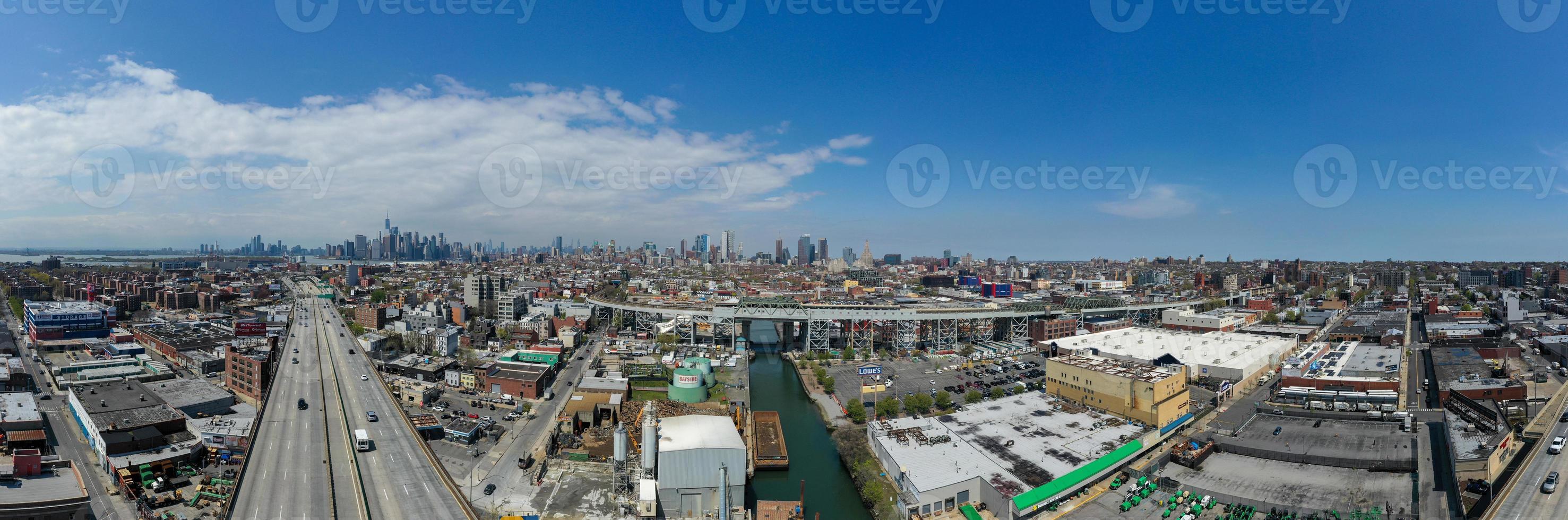 Panoramic view of the Gowanus Canal in Brooklyn with the Gowanus Expressway and Manhattan in the background. photo