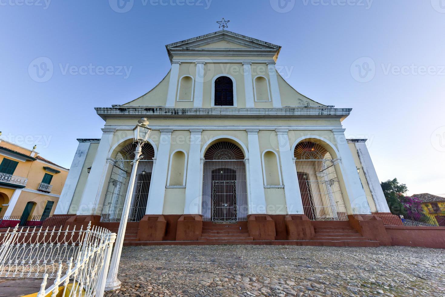 Holy Trinity Church in Trinidad, Cuba. The church has a Neoclassical facade and is visited by thousands of tourists every year. photo
