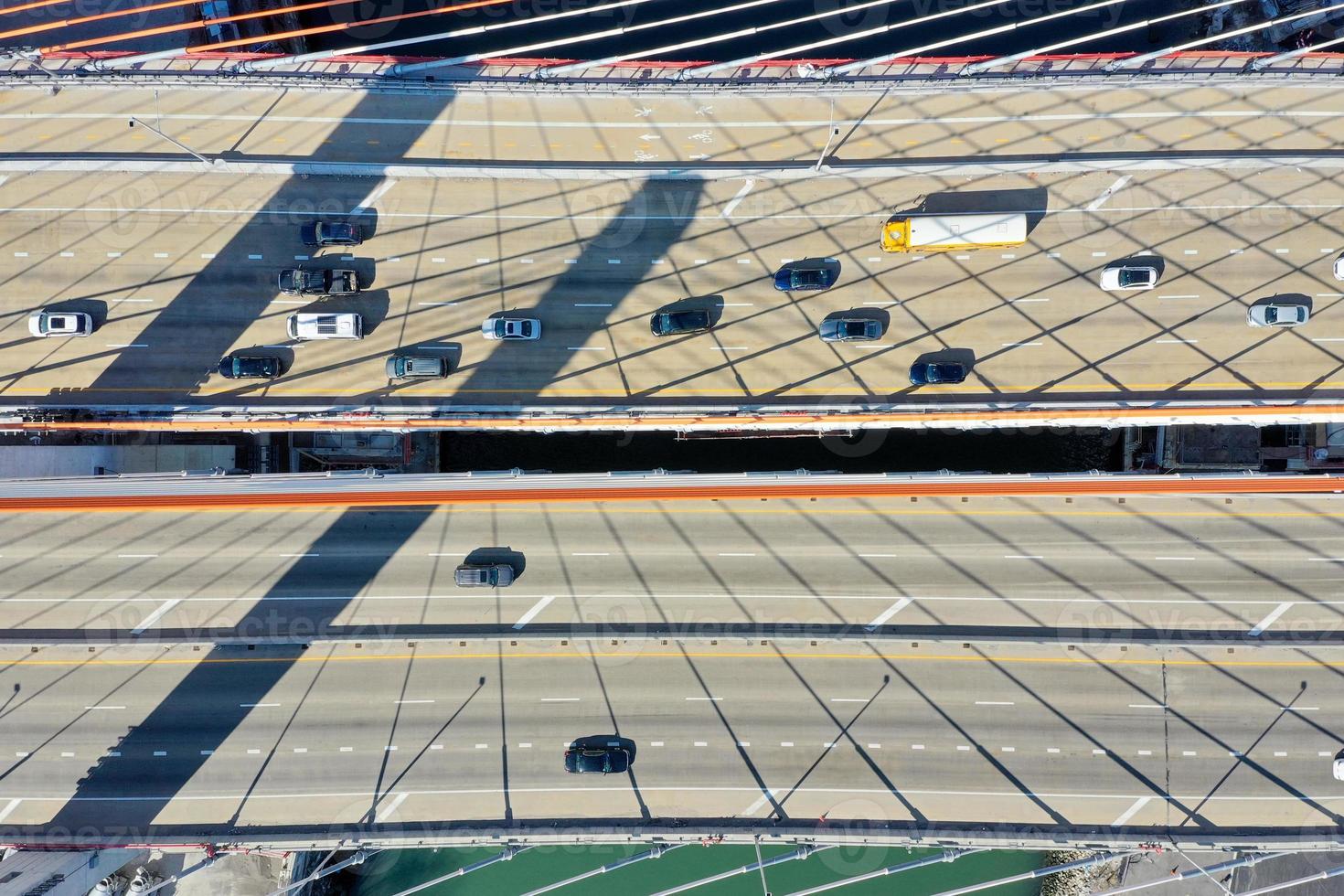 View over Kosciuszko Bridge joining Brooklyn and Queens in New York City across Newtown Creek. The new bridge is a cable-stayed bridge. photo