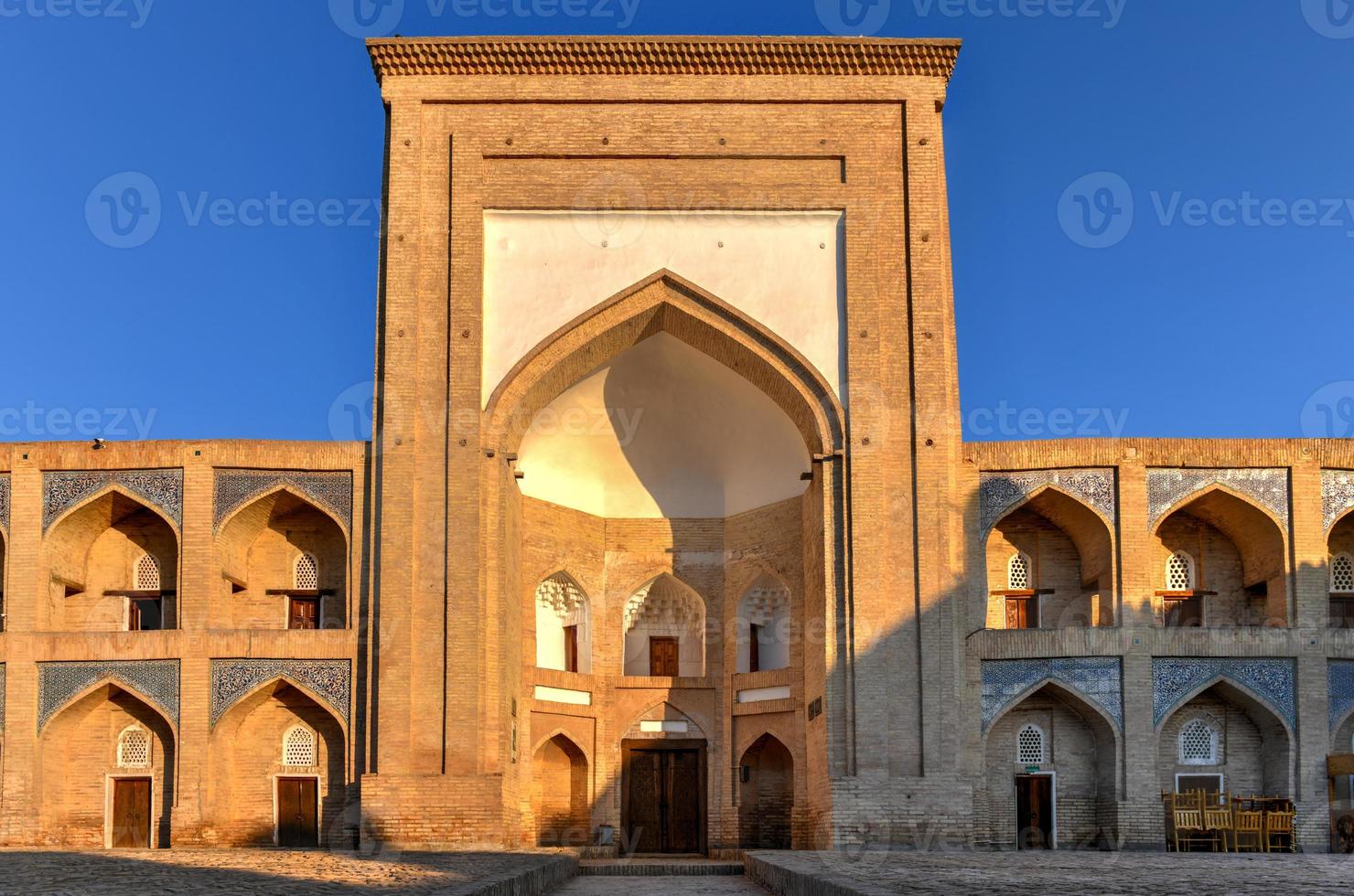 Kutlug-Murad Inaka Madrasa in Khiva, Uzbekistan. The madrassah of Kutlug-Murad-inak was the first two-storied madrassah in Khiva. photo